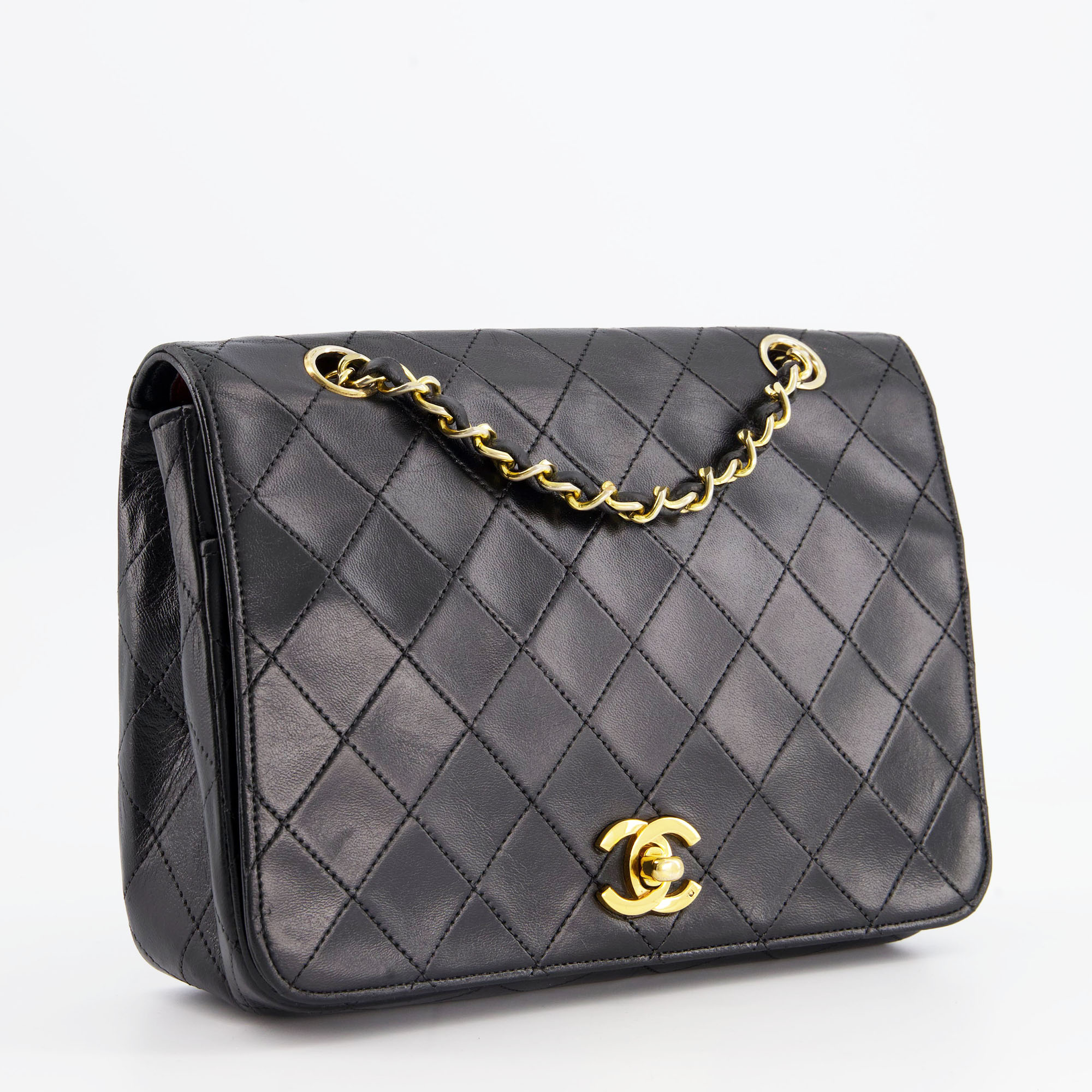 Chanel Black Vintage Small Single Full Flap Bag in Lambskin with 24K Gold Hardware
Chanel Black Vintage Small Single Full Flap Bag in Lambskin with 24K Gold Hardware