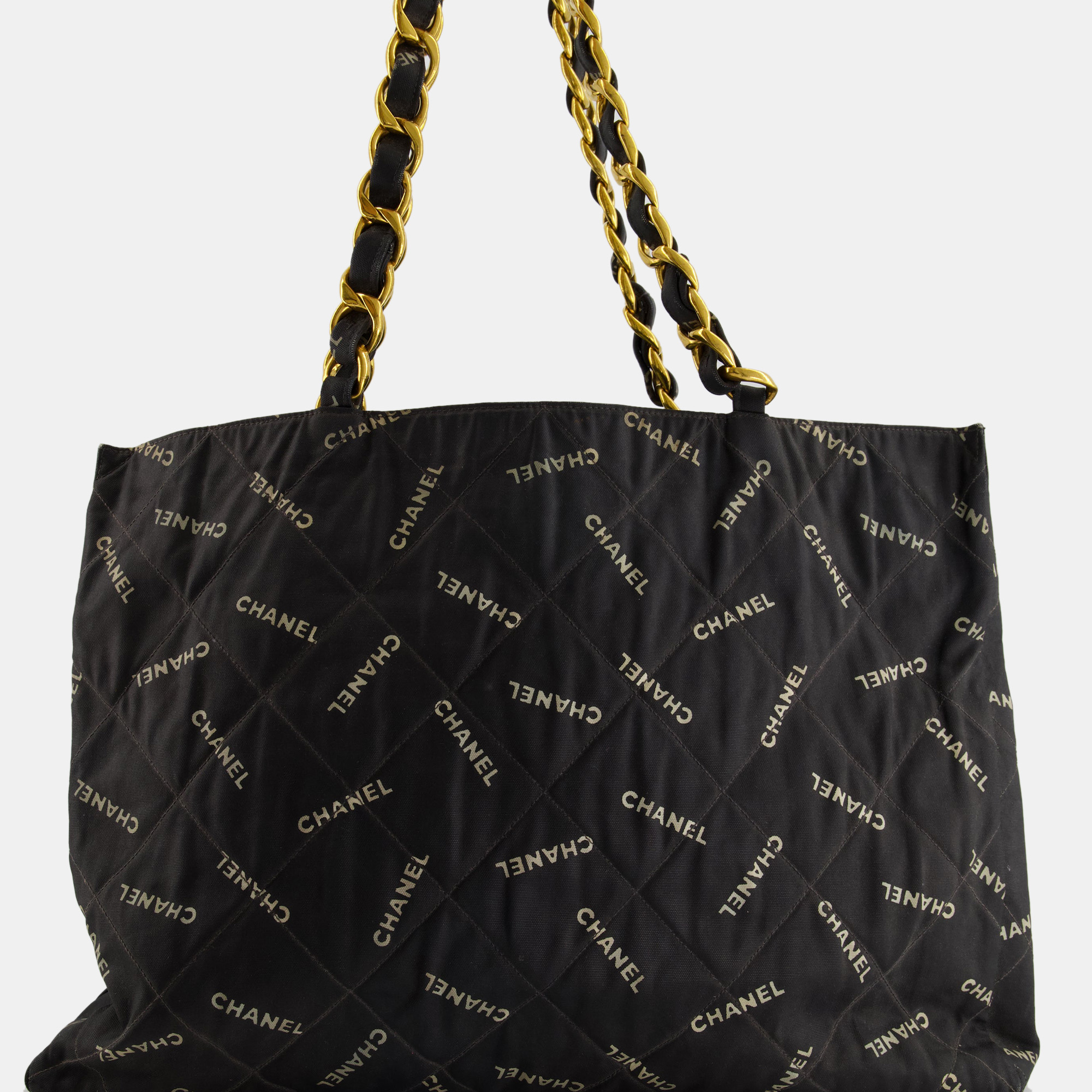 Chanel Vintage Black Bag In Quilted Canvas Logo Print With Gold Hardware