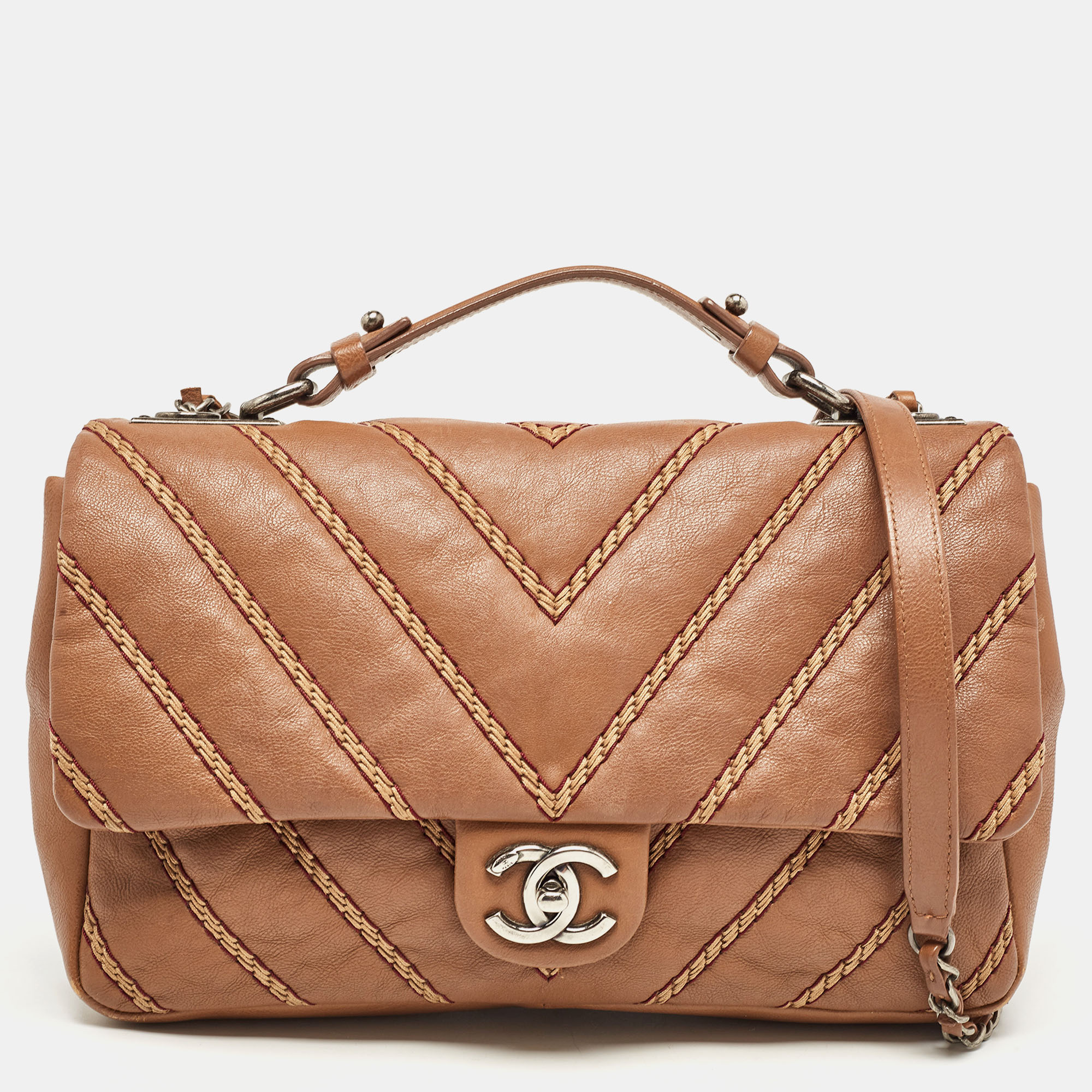 Chanel brown chevron stitched leather classic top handle bag