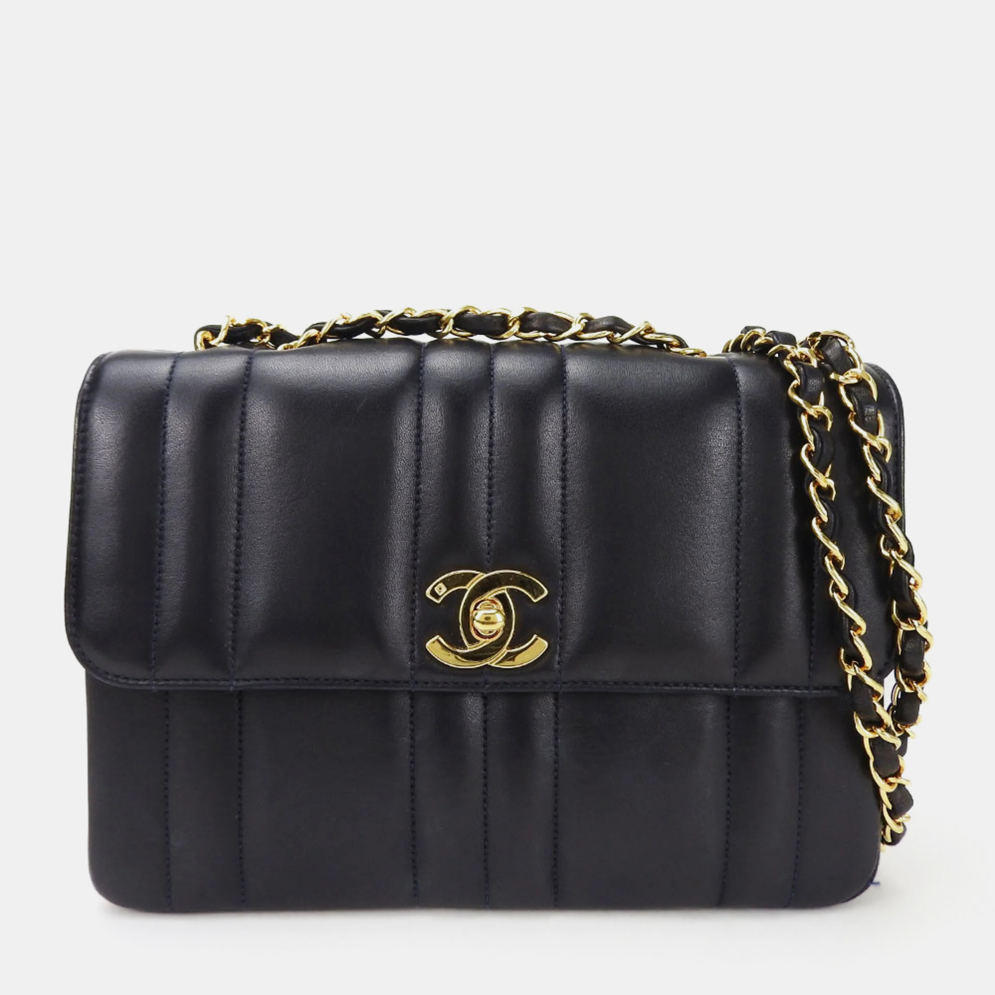 Chanel black vertical quilted caviar flap bag