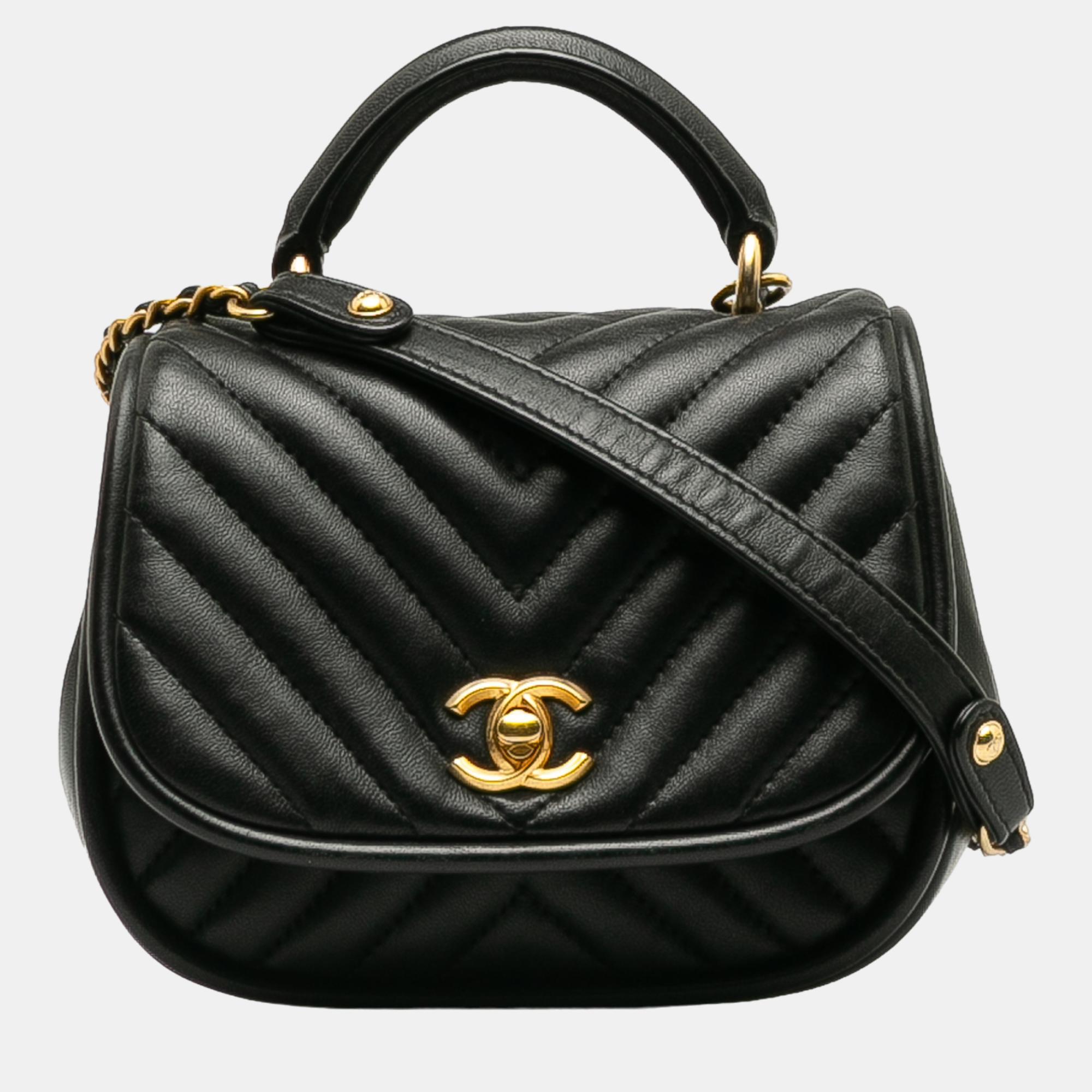 Chanel black mini reverse quilted chevron lambskin round satchel