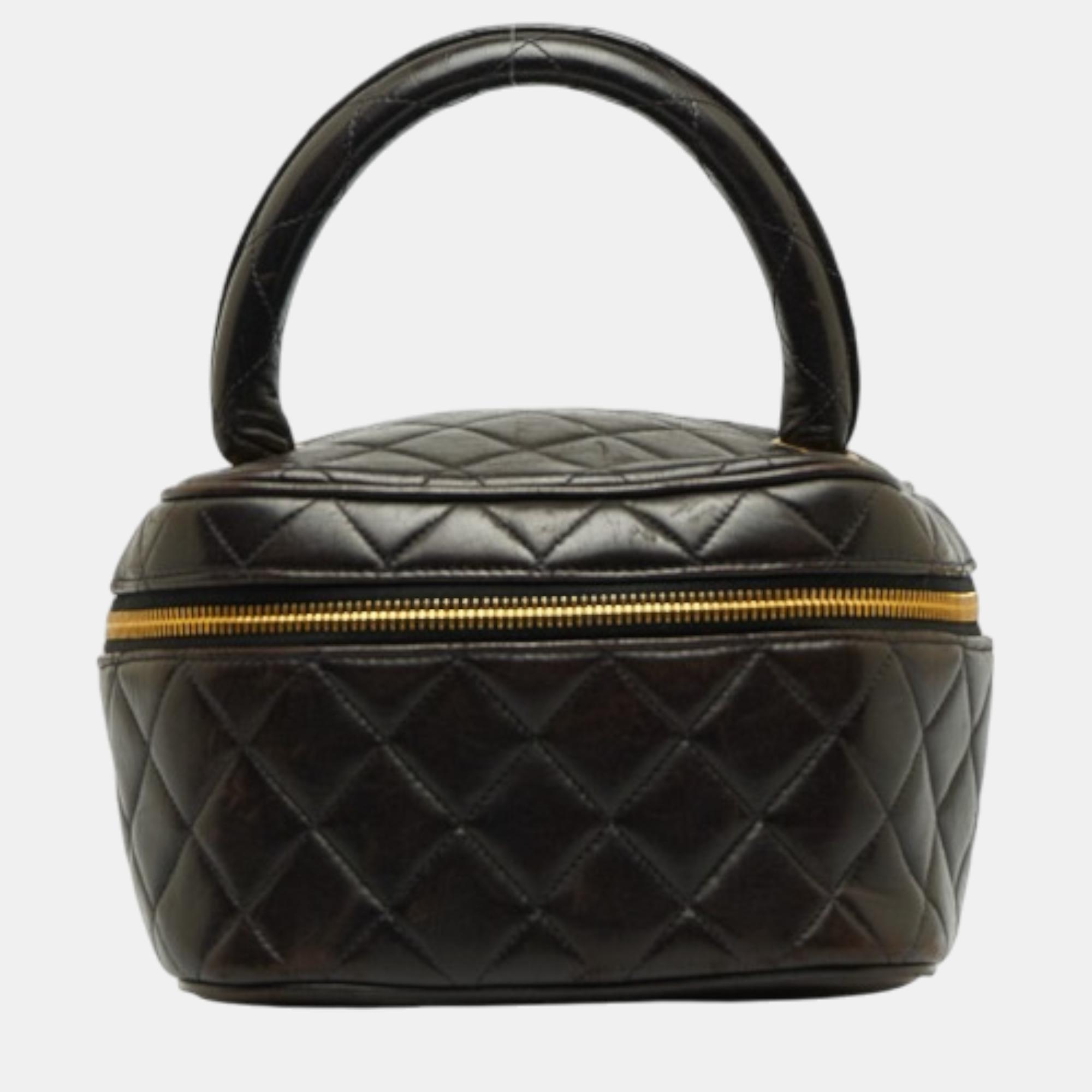 Chanel black leather quilted cc vanity case