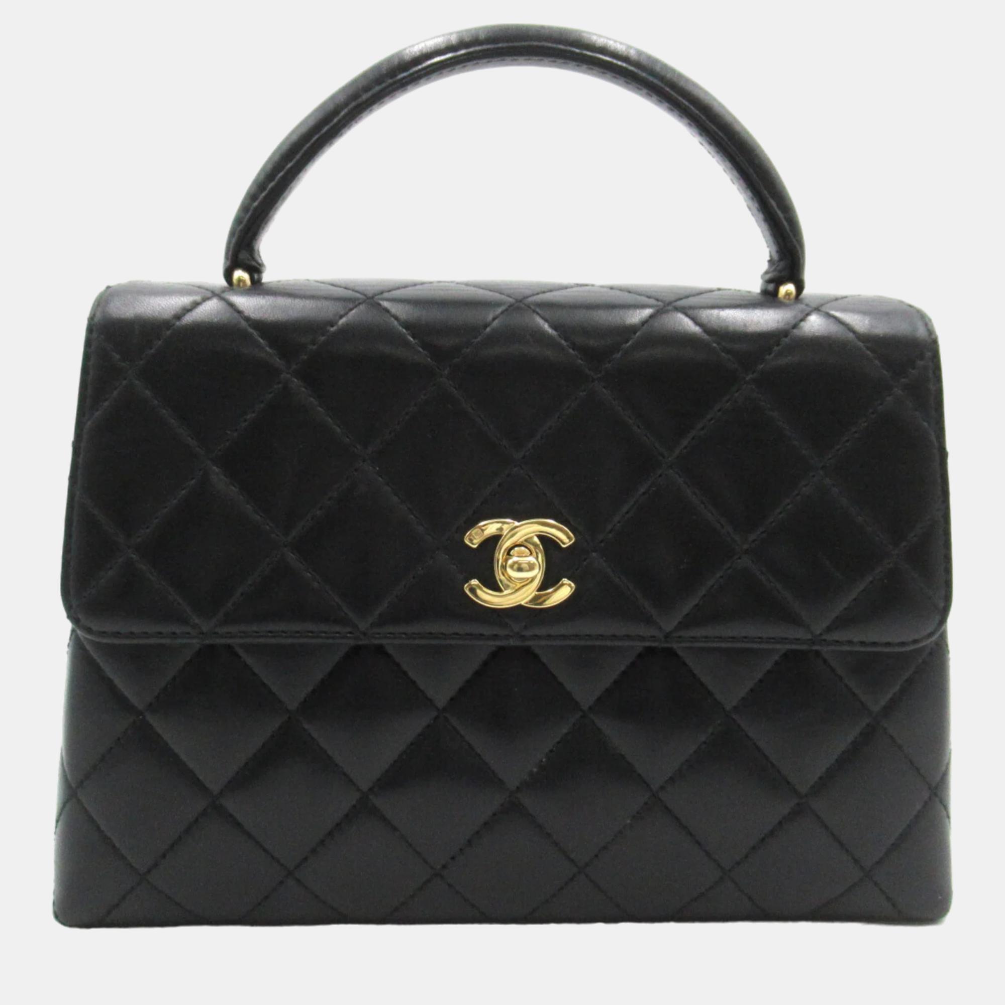 Chanel black quilted leather small kelly top handle bag
