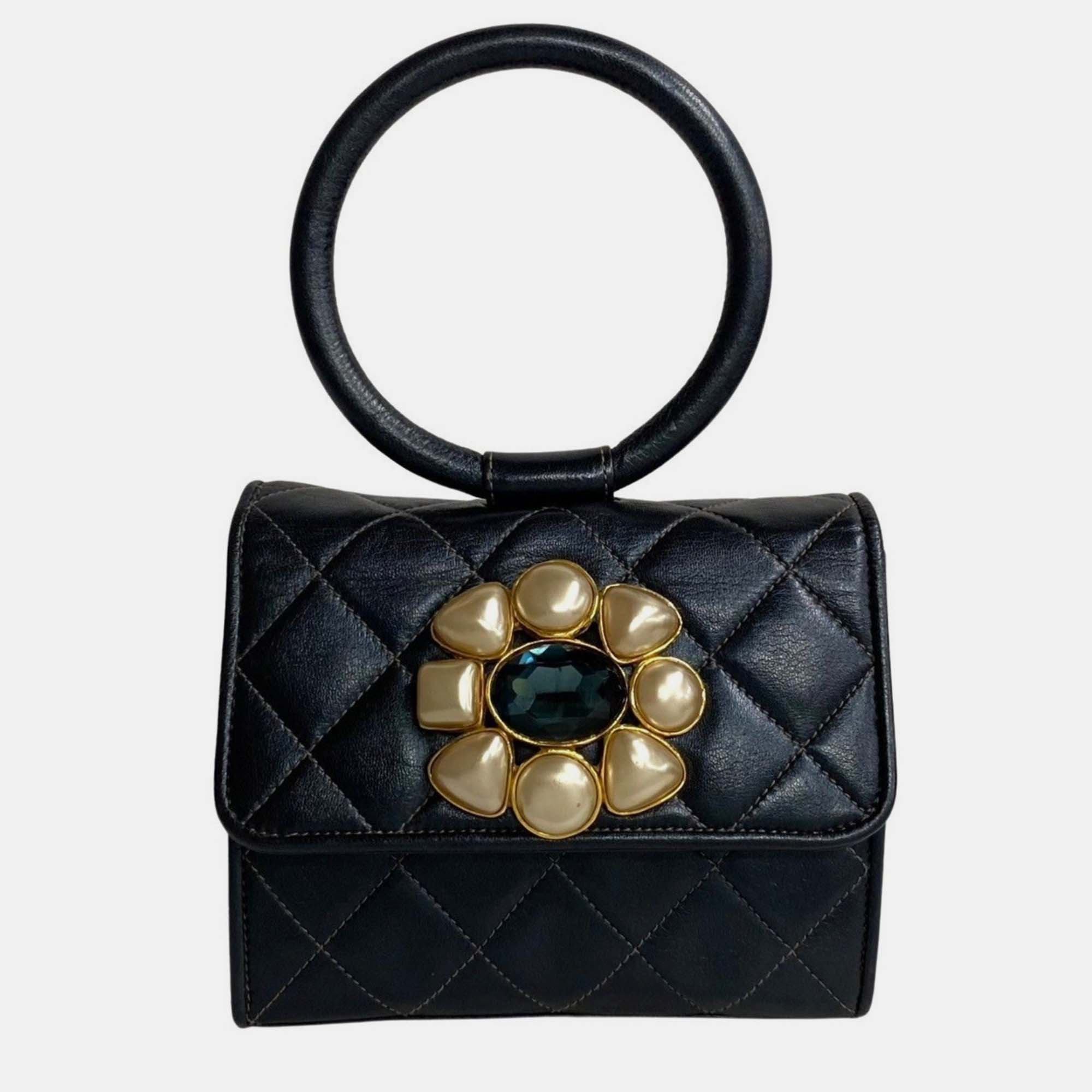 Chanel lambskin evening bag with pearls and jewell bracelet bag