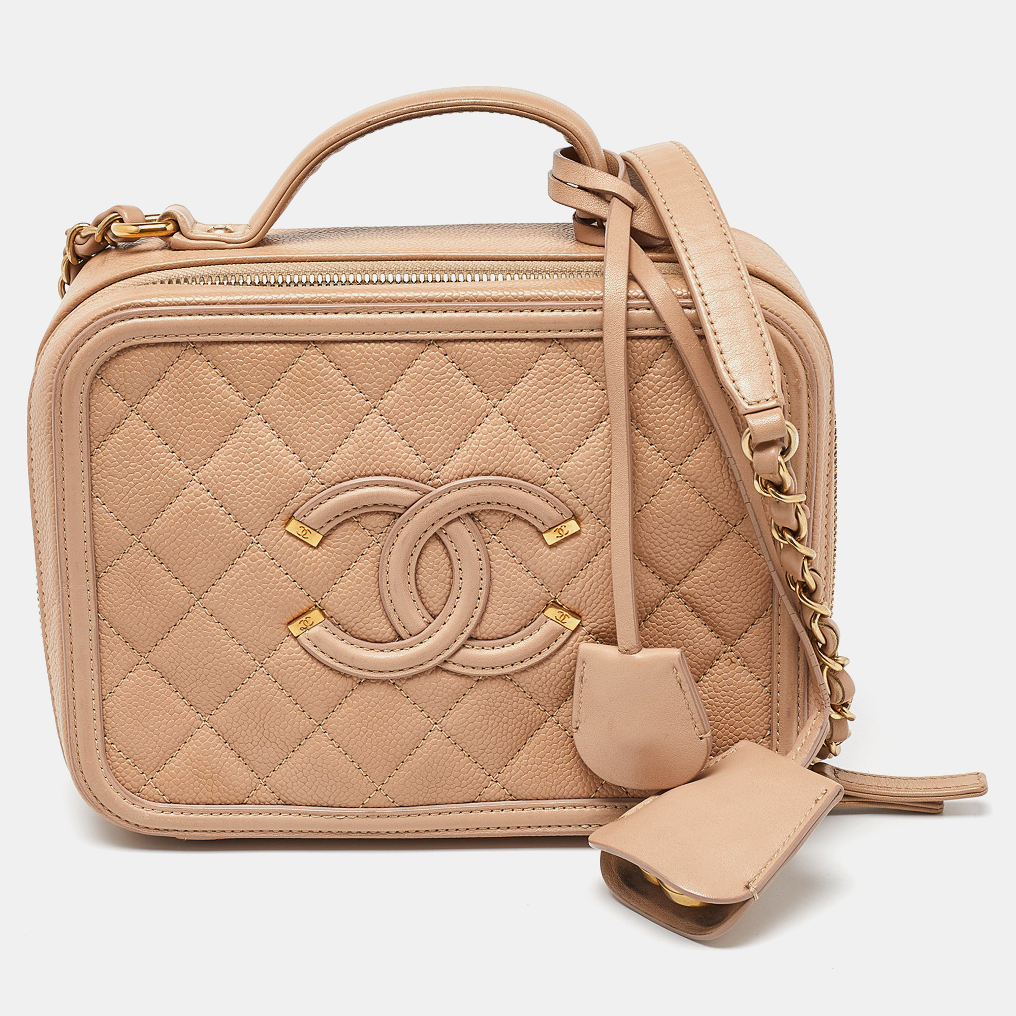 

Chanel Beige Quilted Caviar Leather  CC Filigree Vanity Case Bag