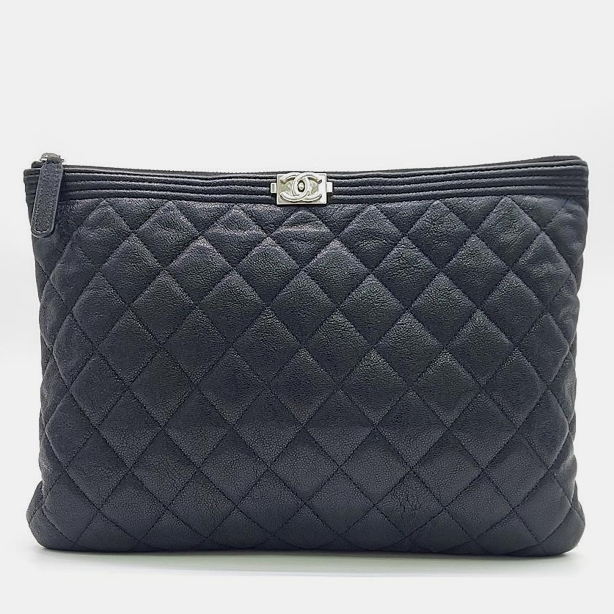 Chanel black caviar leather medium boy clutch bag