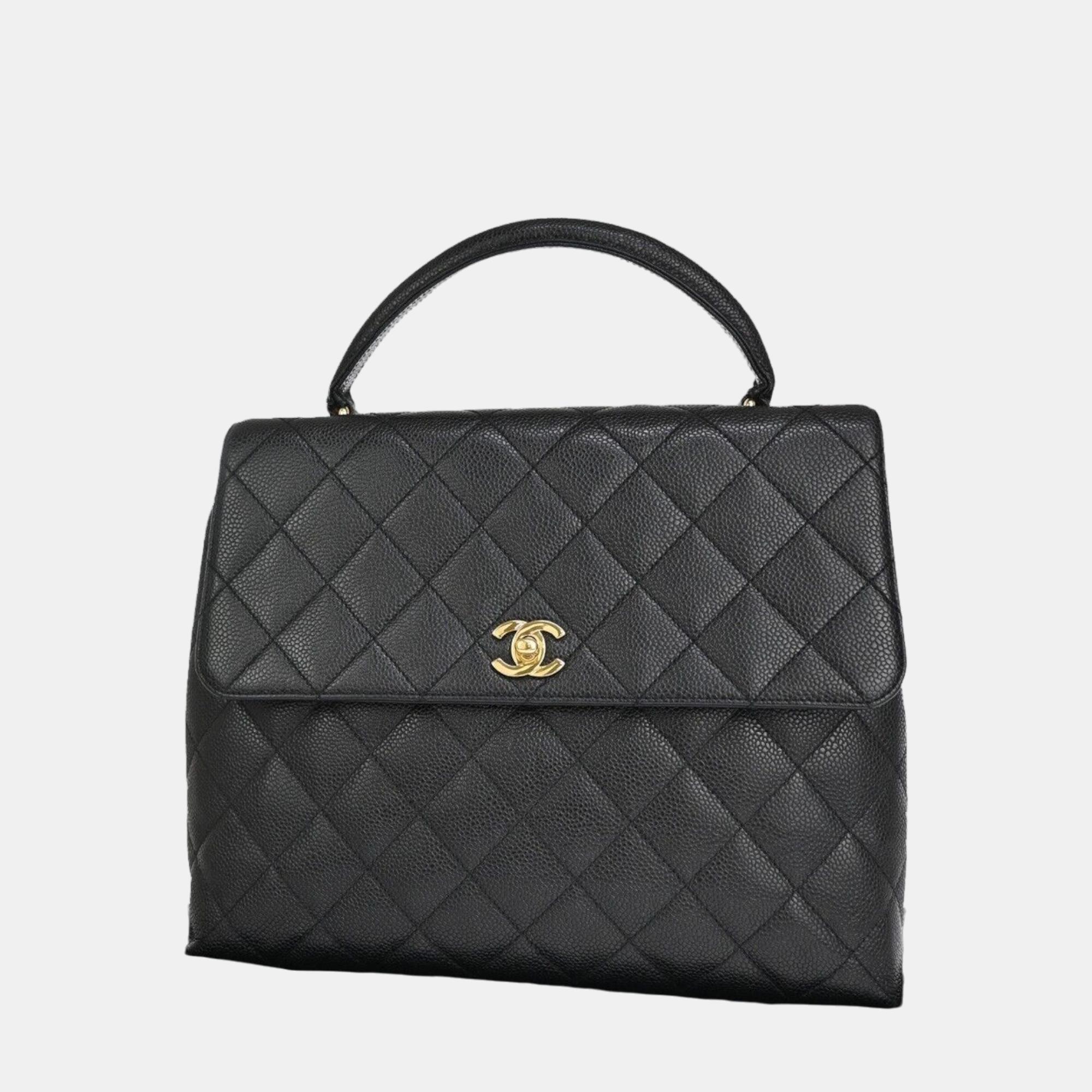 Chanel black leather small kelly top handle bags