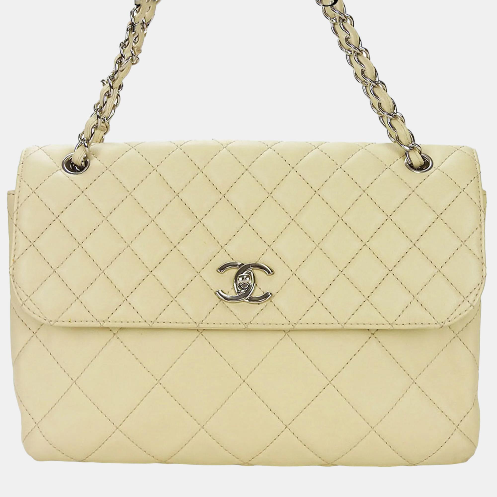 Chanel beige quilted lambskin maxi in the business flap shoulder bag