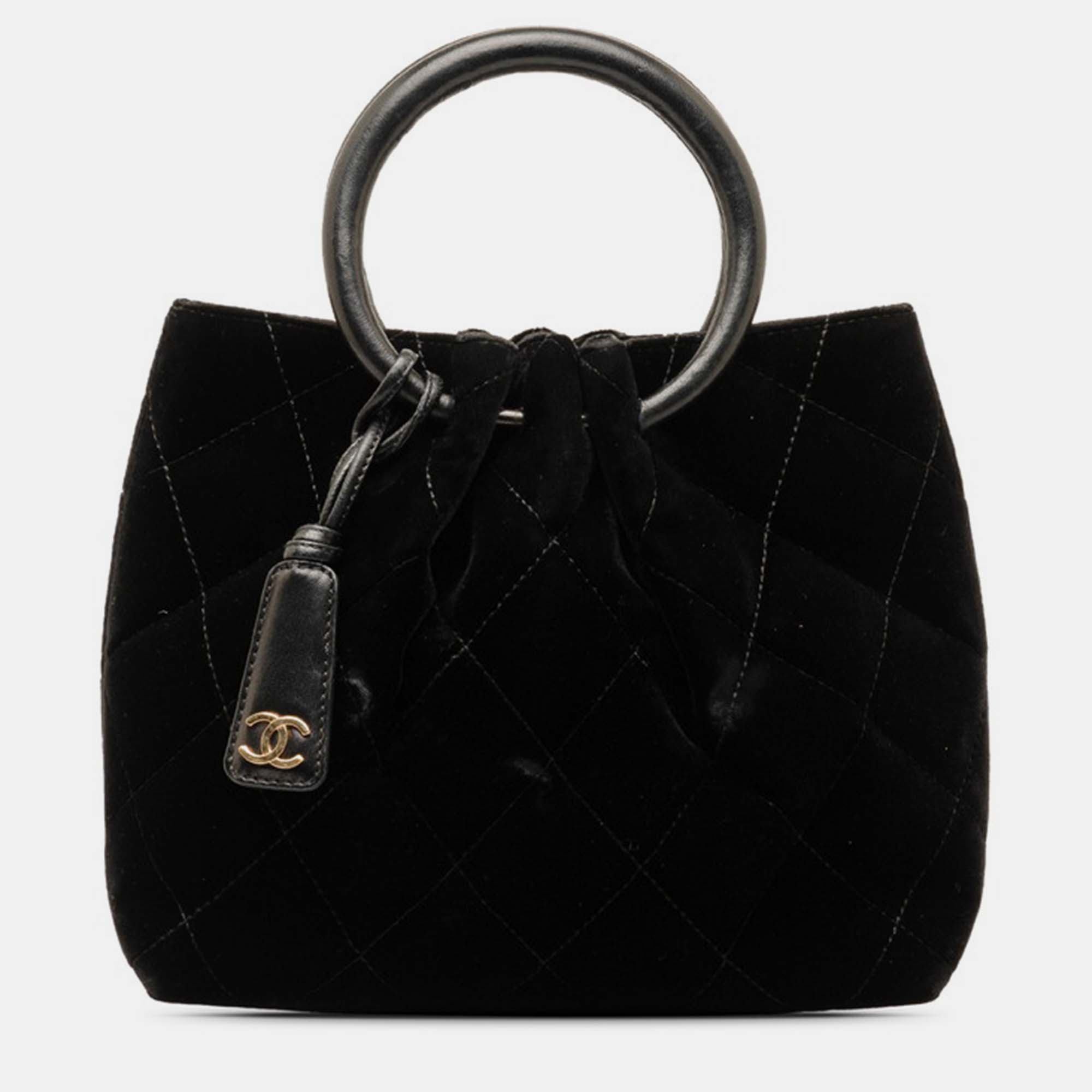 Chanel black canvas quilted velvet ring top handle bag