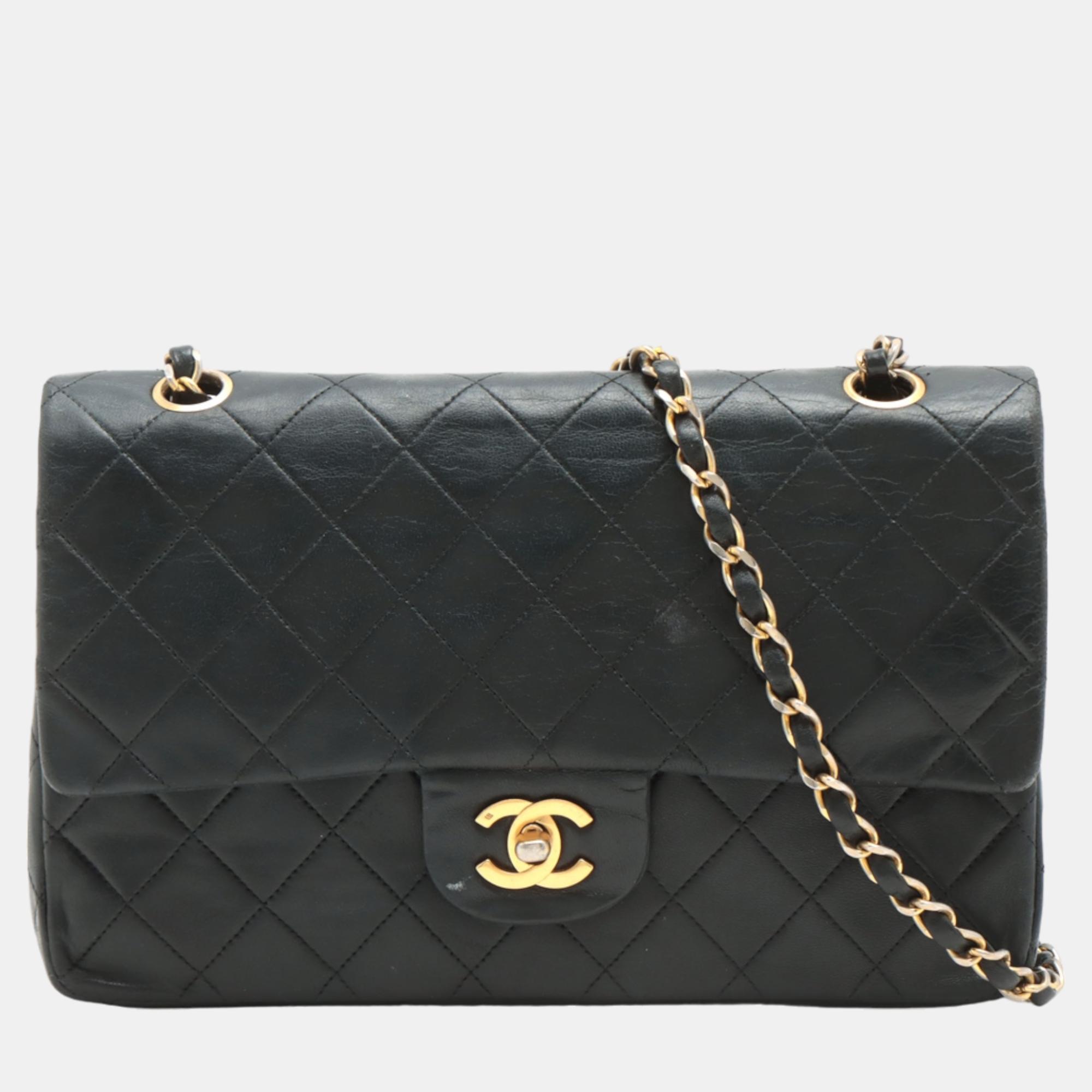 Chanel black leather medium classic double flap shoulder bags