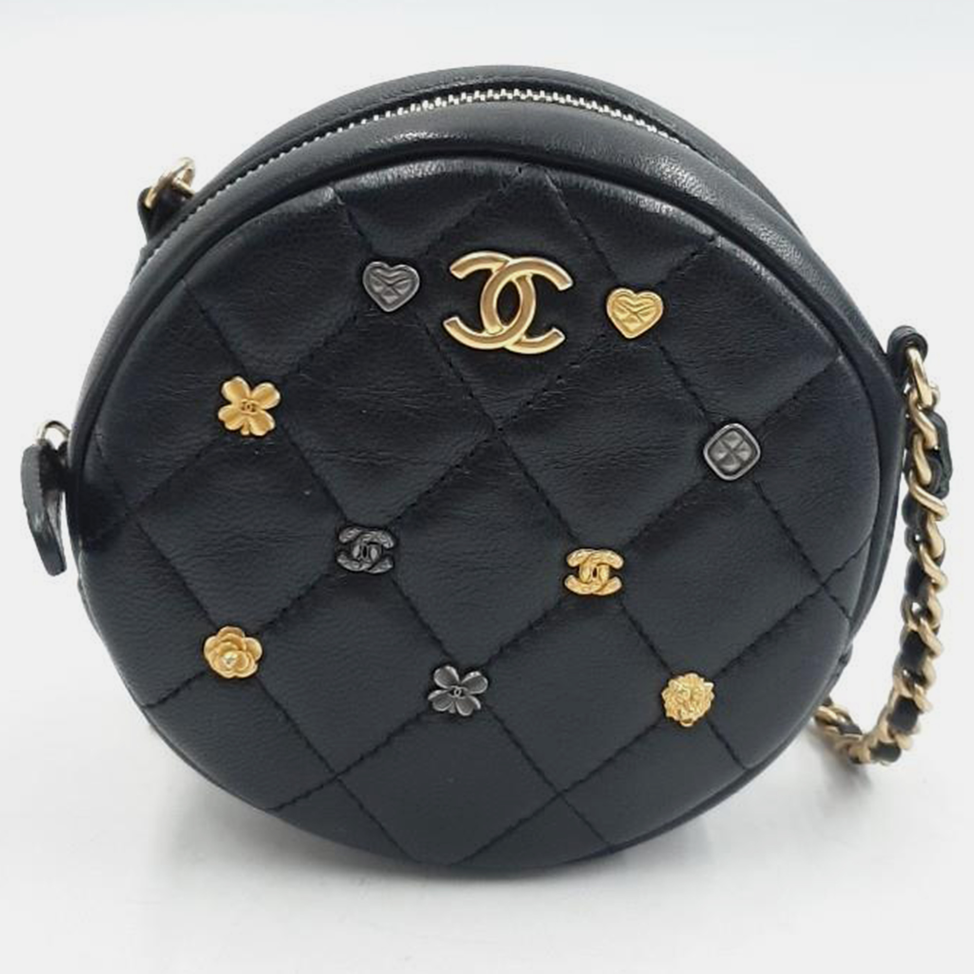 Chanel black leather round mini crossbody bag
