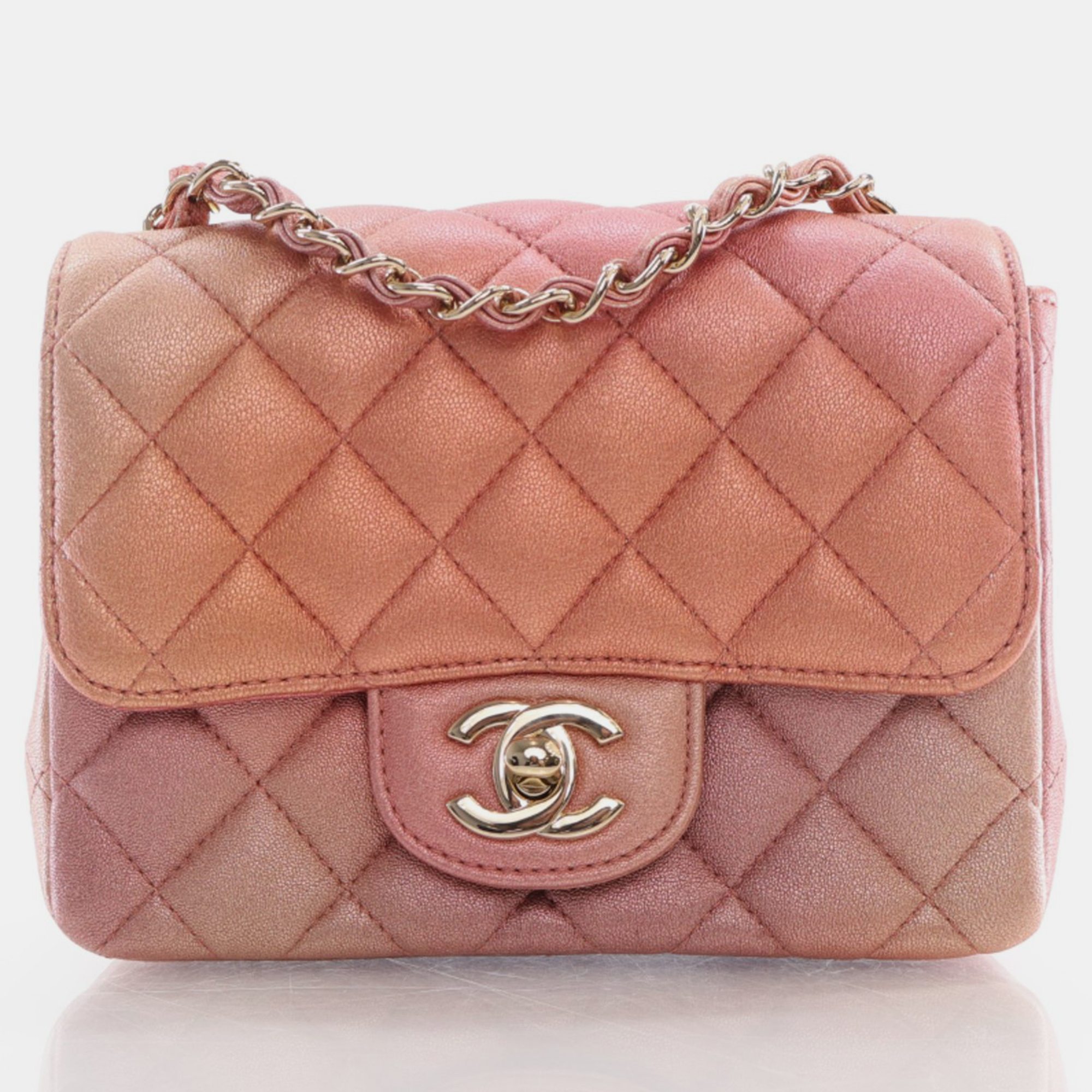 Chanel metallic rose gold quilted calfskin mini classic flap bag