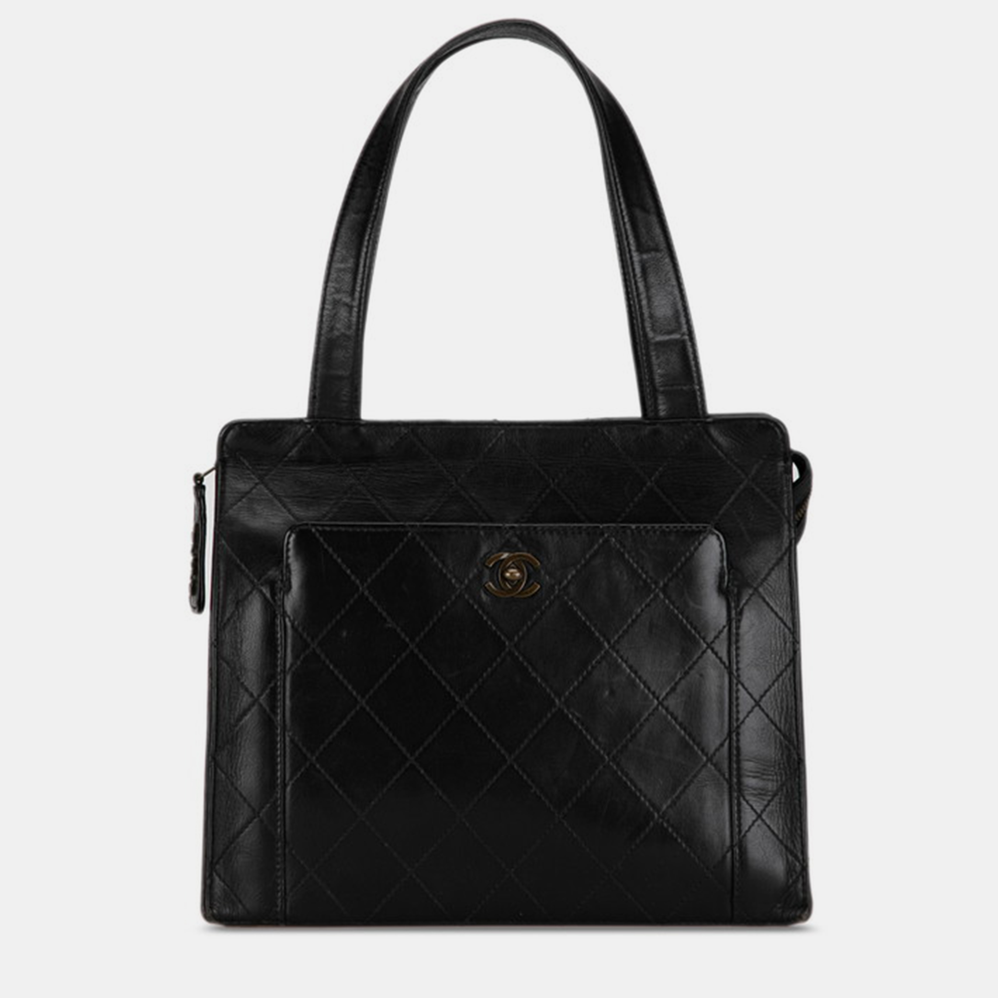 Chanel black leather quilted leather tote bag