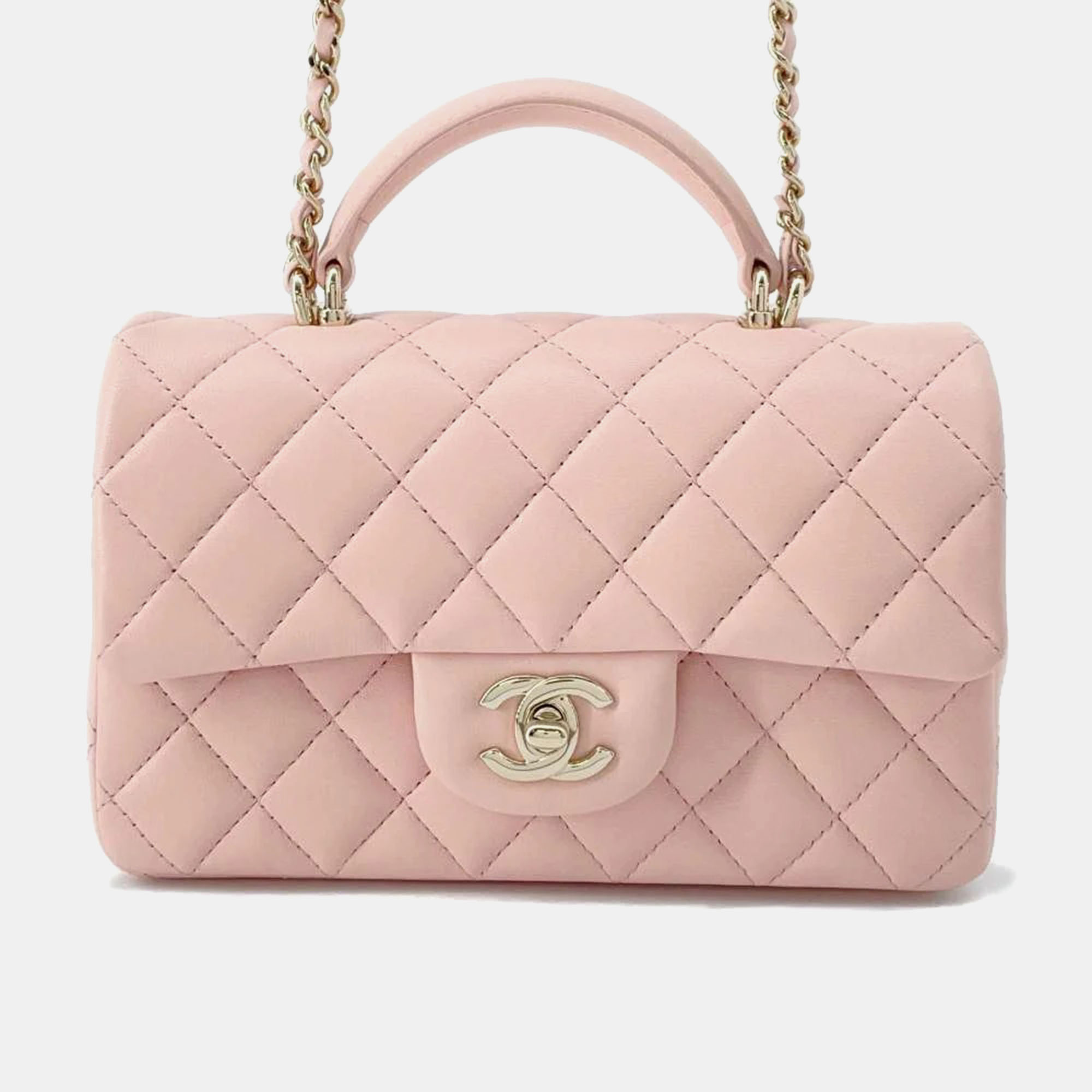 Chanel pink lambskin top handle mini flap bag