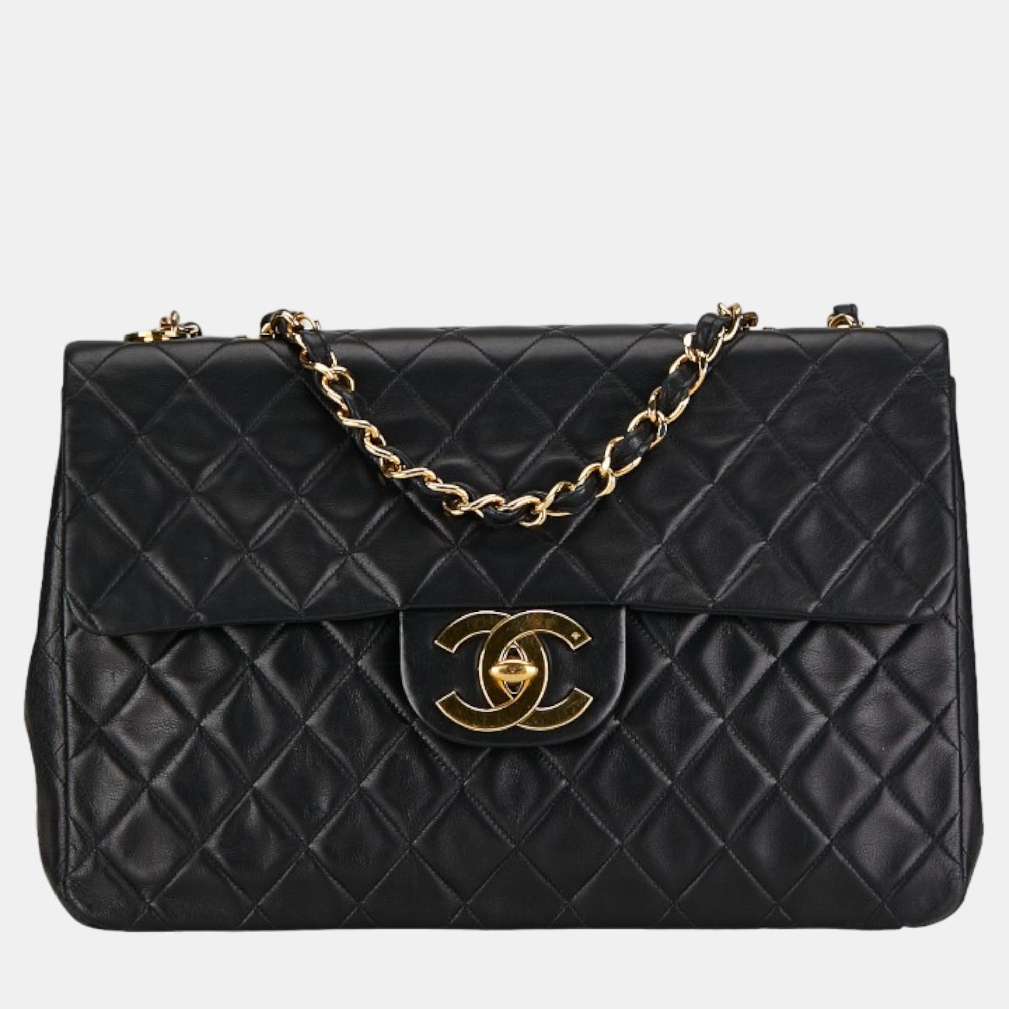 Chanel black leather classic maxi double flap bag