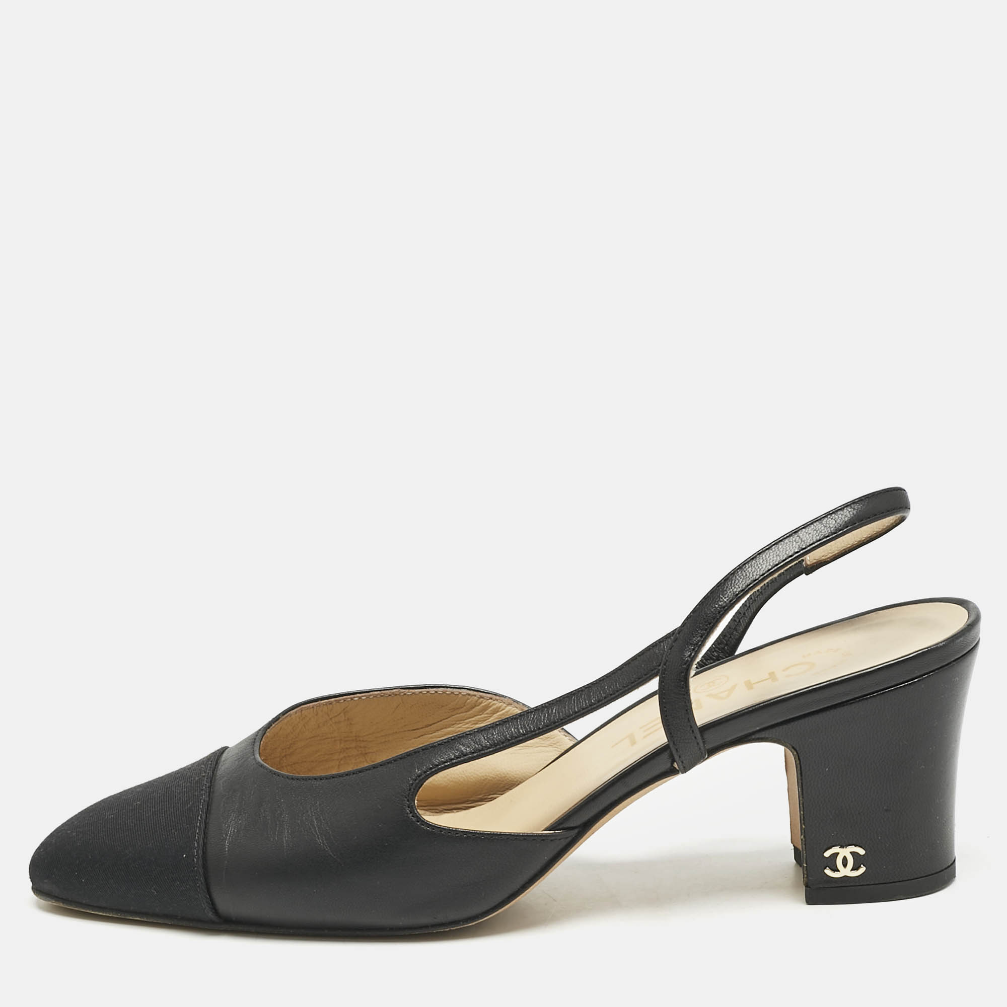 Chanel Black Leather and Fabric CC Cap Toe Slingback Pumps Size
Chanel Black Leather and Fabric CC Cap Toe Slingback Pumps Size