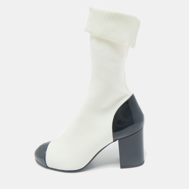 Chanel White/Black Patent Leather and Stretch Fabric CC Sock Ankle Length Boots Size
Chanel White/Black Patent Leather and Stretch Fabric CC Sock Ankle Length Boots Size