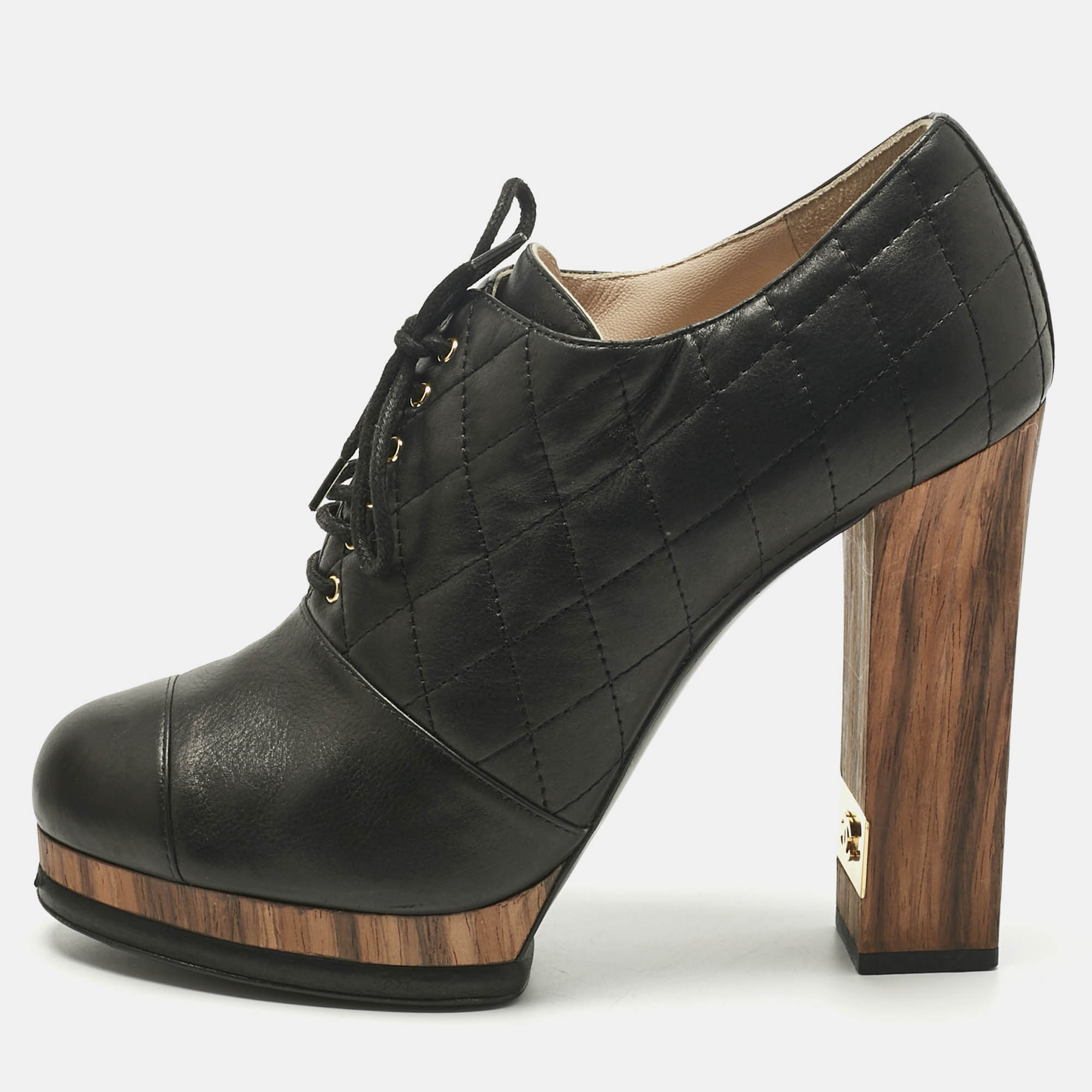 Chanel Black Quilted Leather CC Block Heel Booties Size 
Chanel Black Quilted Leather CC Block Heel Booties Size