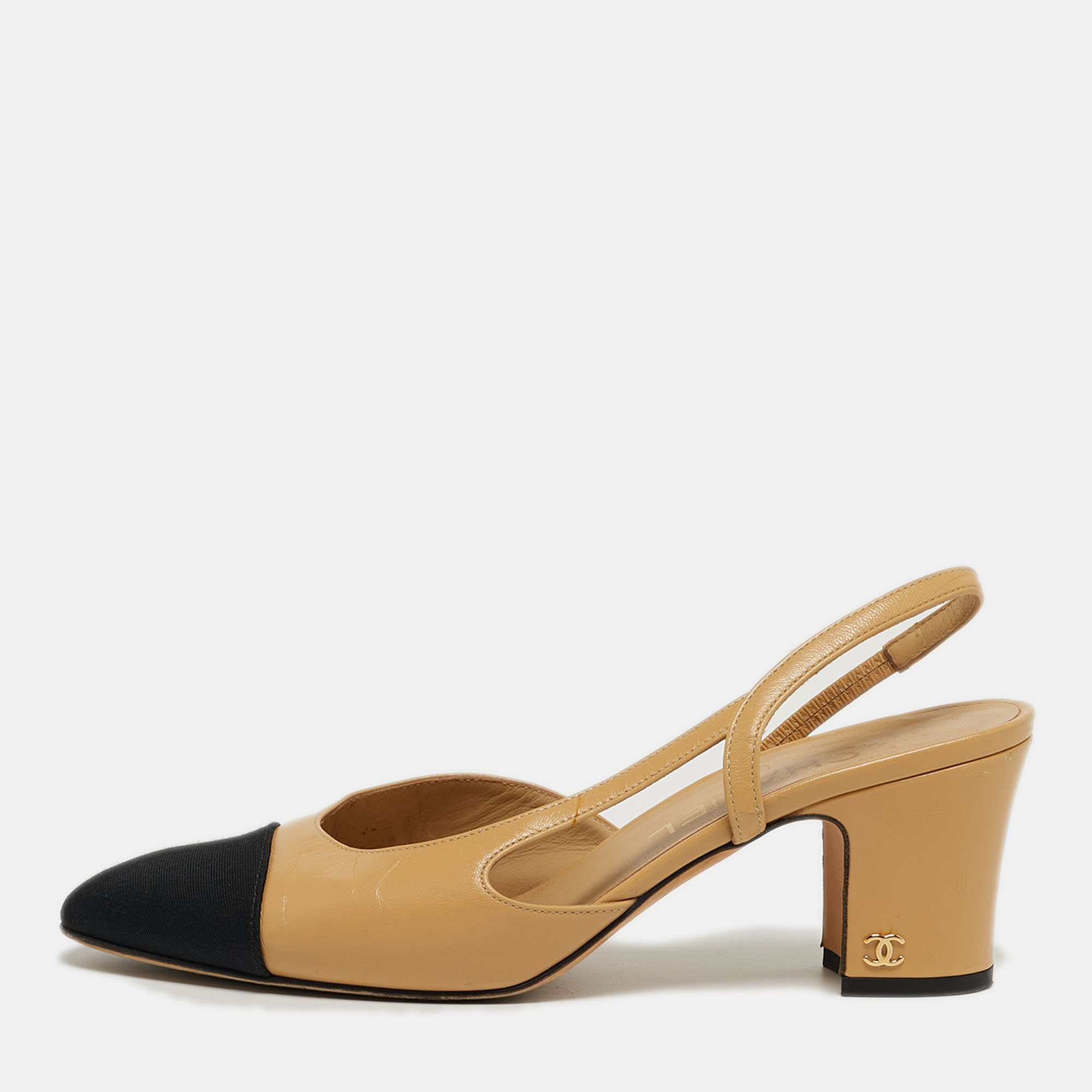 Chanel CC Size Beige/Black Canvas and Leather Cap Toe Slingback Pumps
Chanel CC Size Beige/Black Canvas and Leather Cap Toe Slingback Pumps