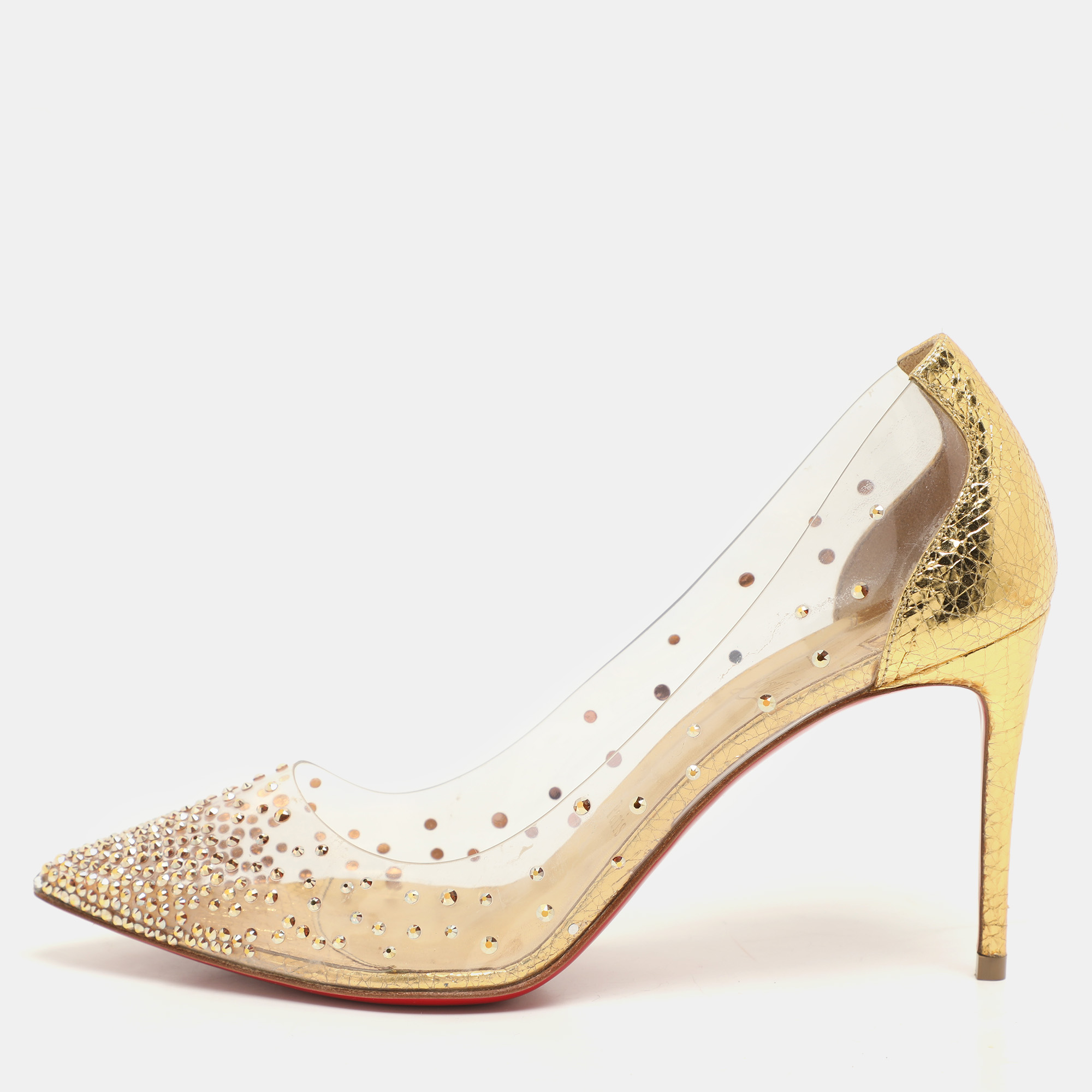 Christian Louboutin Transparent/Gold Leather and PVC Degrastrass Pumps Size 37
Christian Louboutin Transparent/Gold Leather and PVC Degrastrass Pumps Size 37