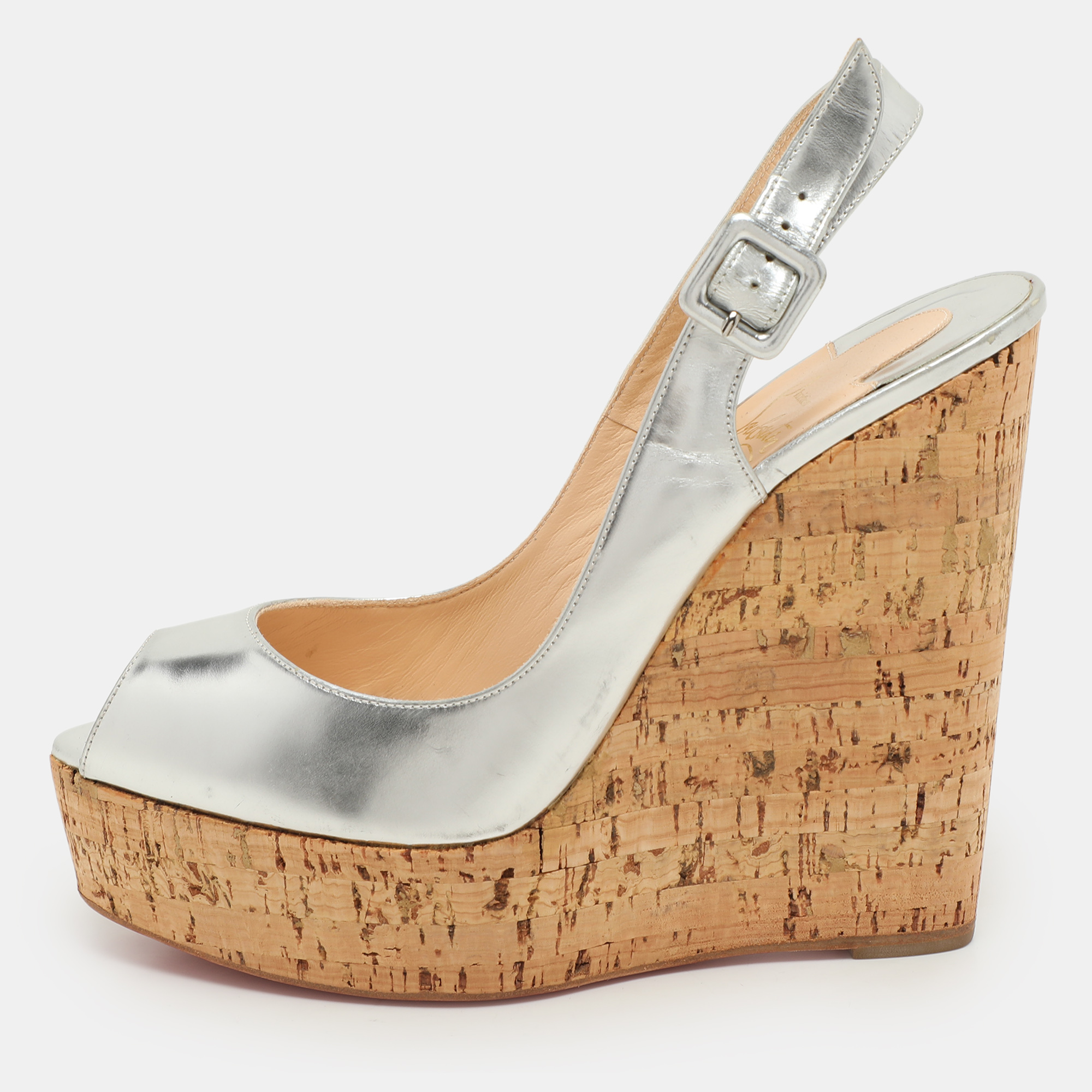 Christian Louboutin Silver Foil Leather Une Plume Peep-Toe Cork Wedge Sandals Size
Christian Louboutin Silver Foil Leather Une Plume Peep-Toe Cork Wedge Sandals Size
