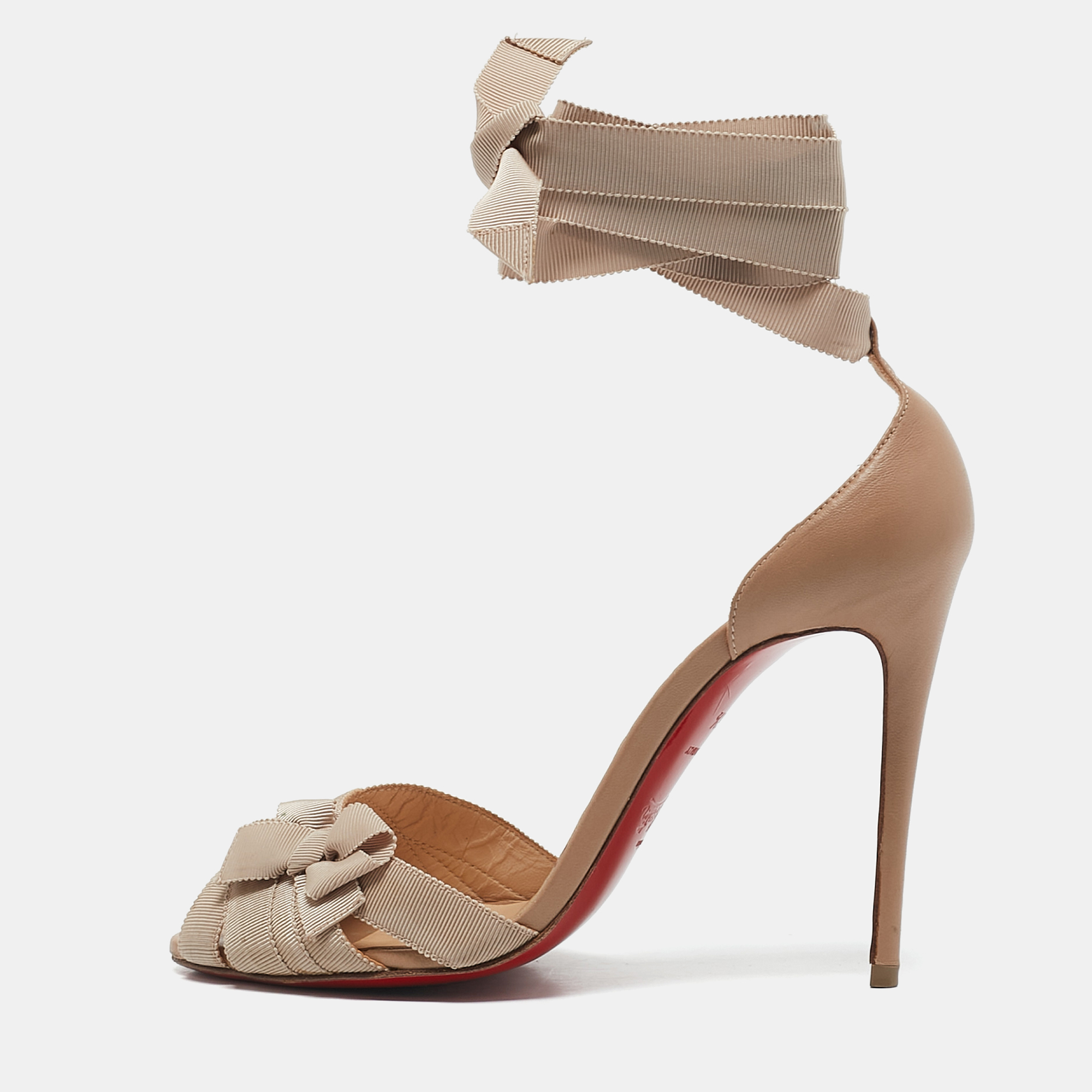 Christian Louboutin Beige Grosgrain and Leather Christeriva Sandals Size
Christian Louboutin Beige Grosgrain and Leather Christeriva Sandals Size