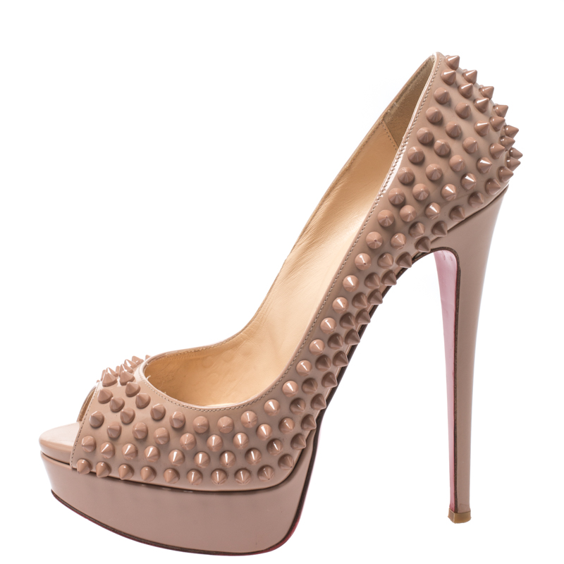 Christian Louboutin Beige Patent Leather Lady Peep Toe Spike Platform Pumps Size
Christian Louboutin Beige Patent Leather Lady Peep Toe Spike Platform Pumps Size