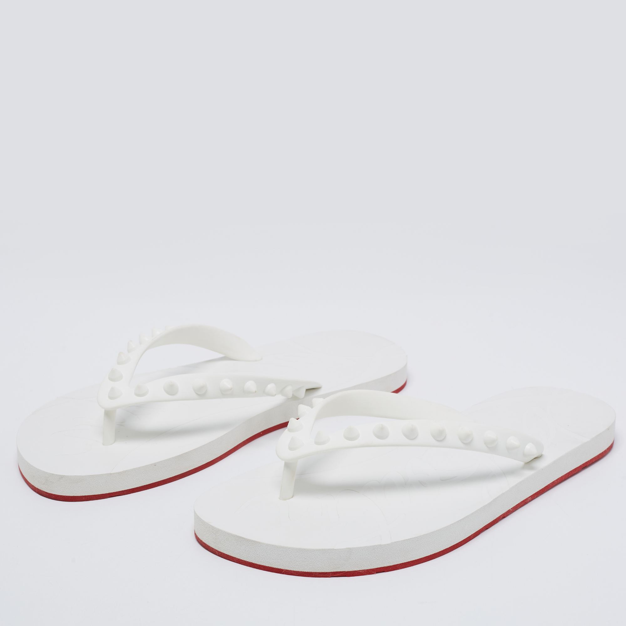 

Christian Louboutin White Donna Spiked Rubber Loubi Thong Flats Size