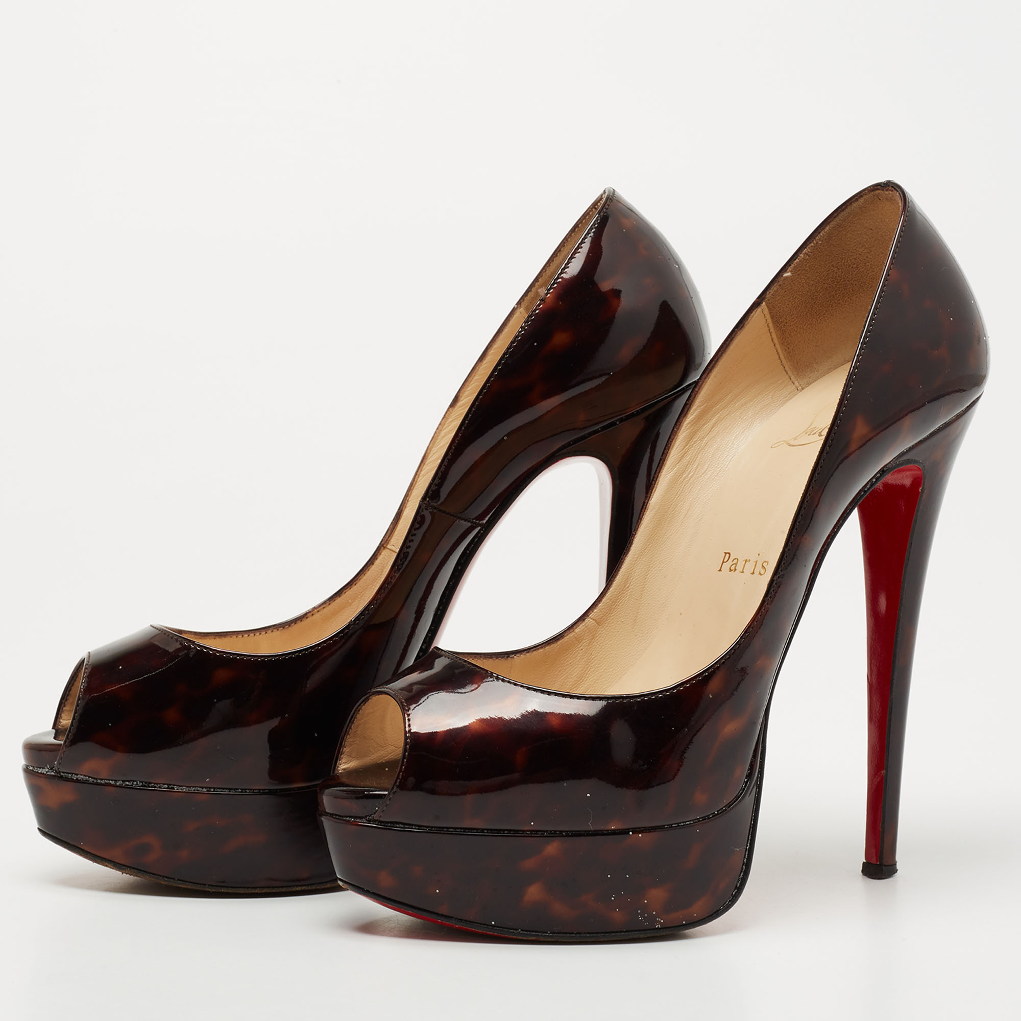 Christian Louboutin Brown Printed Patent Leather Lady Peep Pumps Size
Christian Louboutin Brown Printed Patent Leather Lady Peep Pumps Size