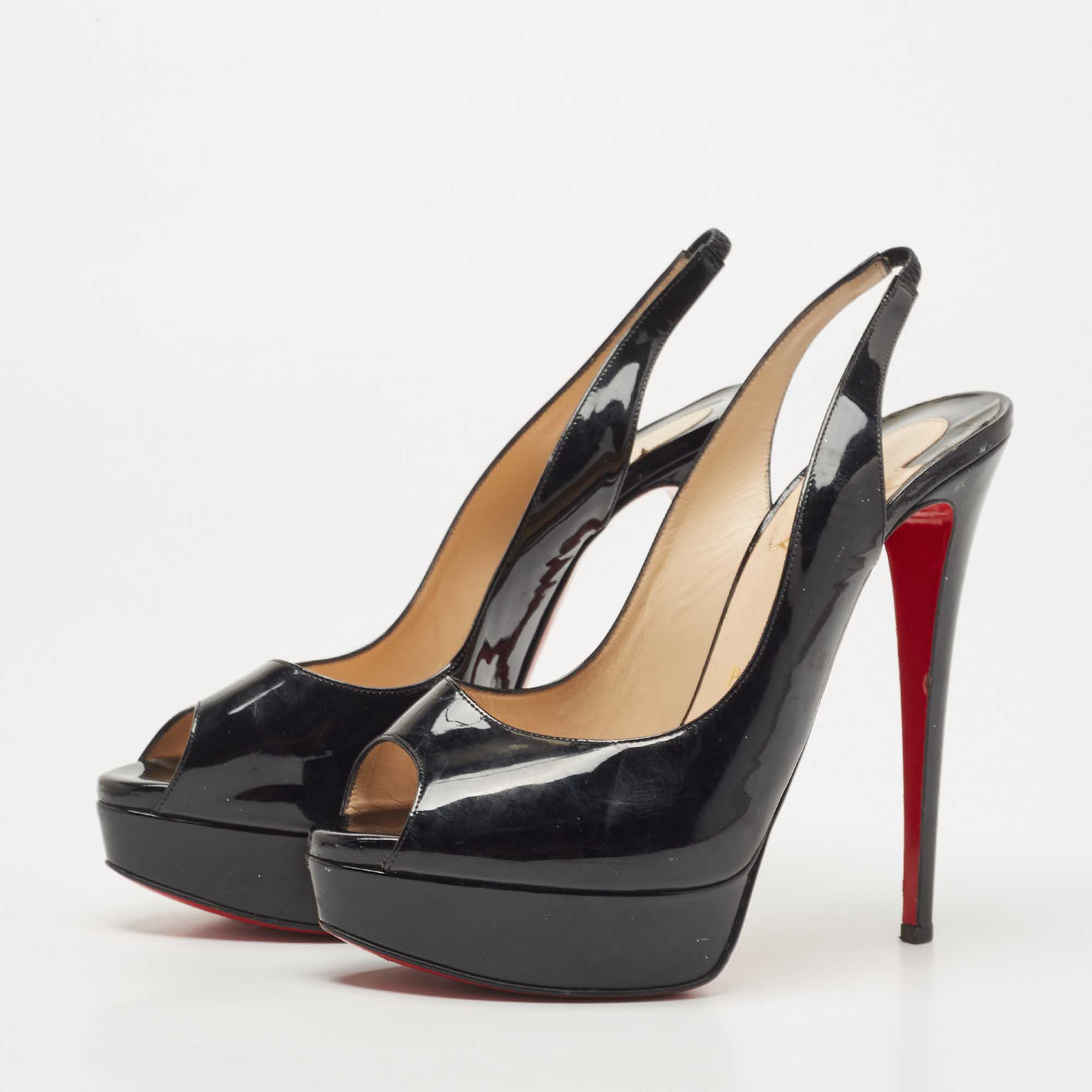 Christian Louboutin Black Patent Leather Lady Peep Platform Peep Toe Slingback Sandals Size
Christian Louboutin Black Patent Leather Lady Peep Platform Peep Toe Slingback Sandals Size