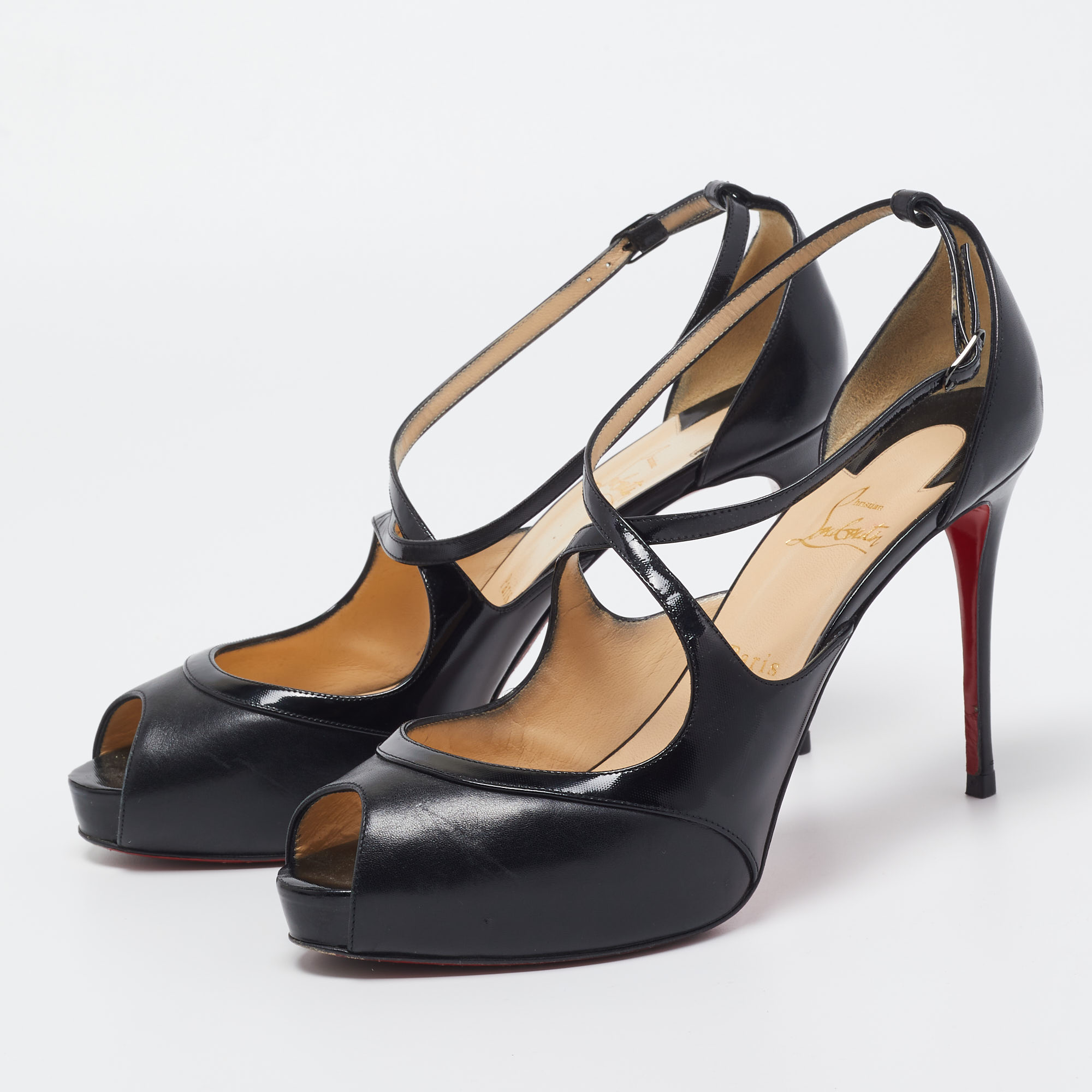 

Christian Louboutin Black Leather and Patent Mira Bella Sandals Size