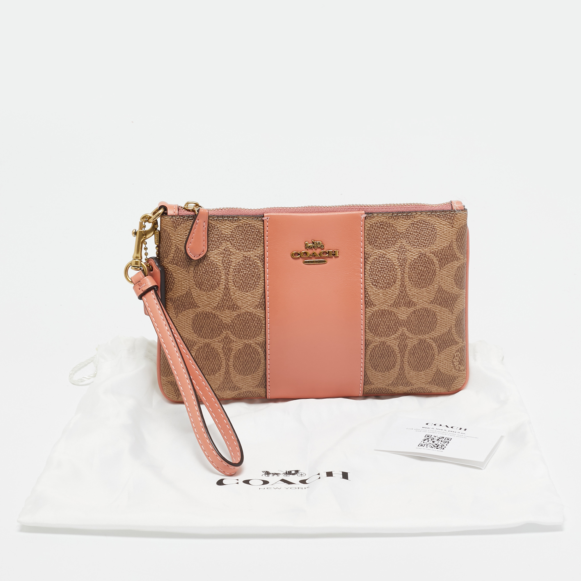 Coach Beige/Peach Signature Coated Canvas And Leather Zip Wristlet Pouch