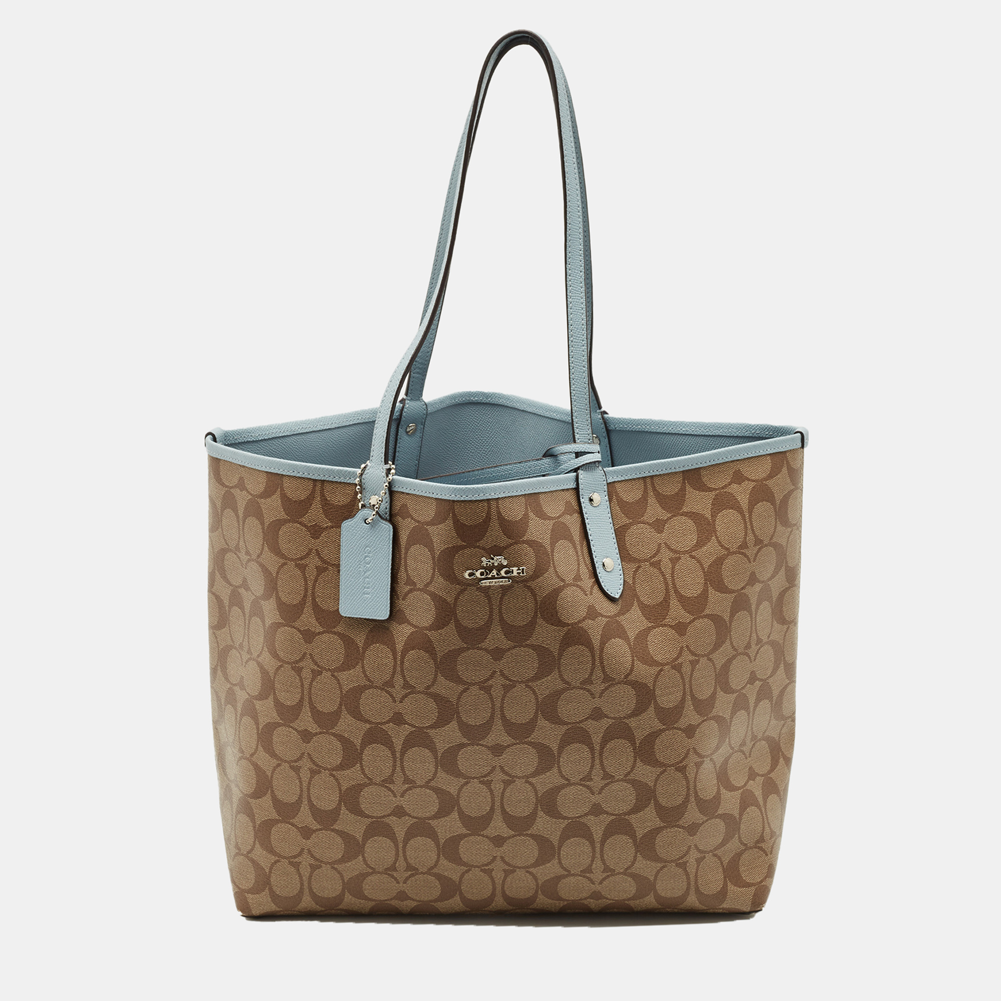 Coach Brown/Light Blue Signature Coated Canvas Reversible City Tote
Coach Brown/Light Blue Signature Coated Canvas Reversible City Tote
