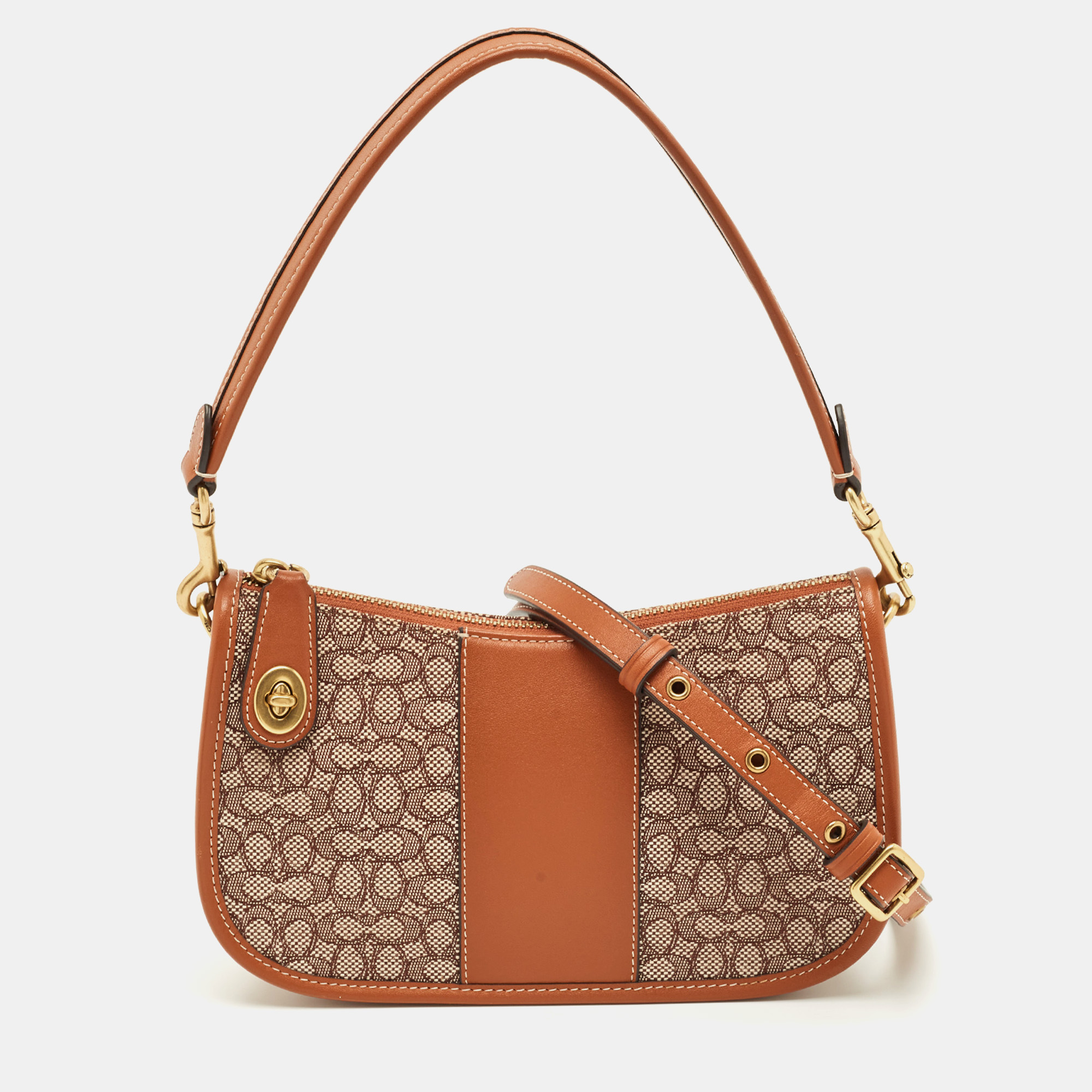 Coach Brown Signature Jacquard Canvas Swinger 23 Shoulder Bag
Coach Brown Signature Jacquard Canvas Swinger 23 Shoulder Bag