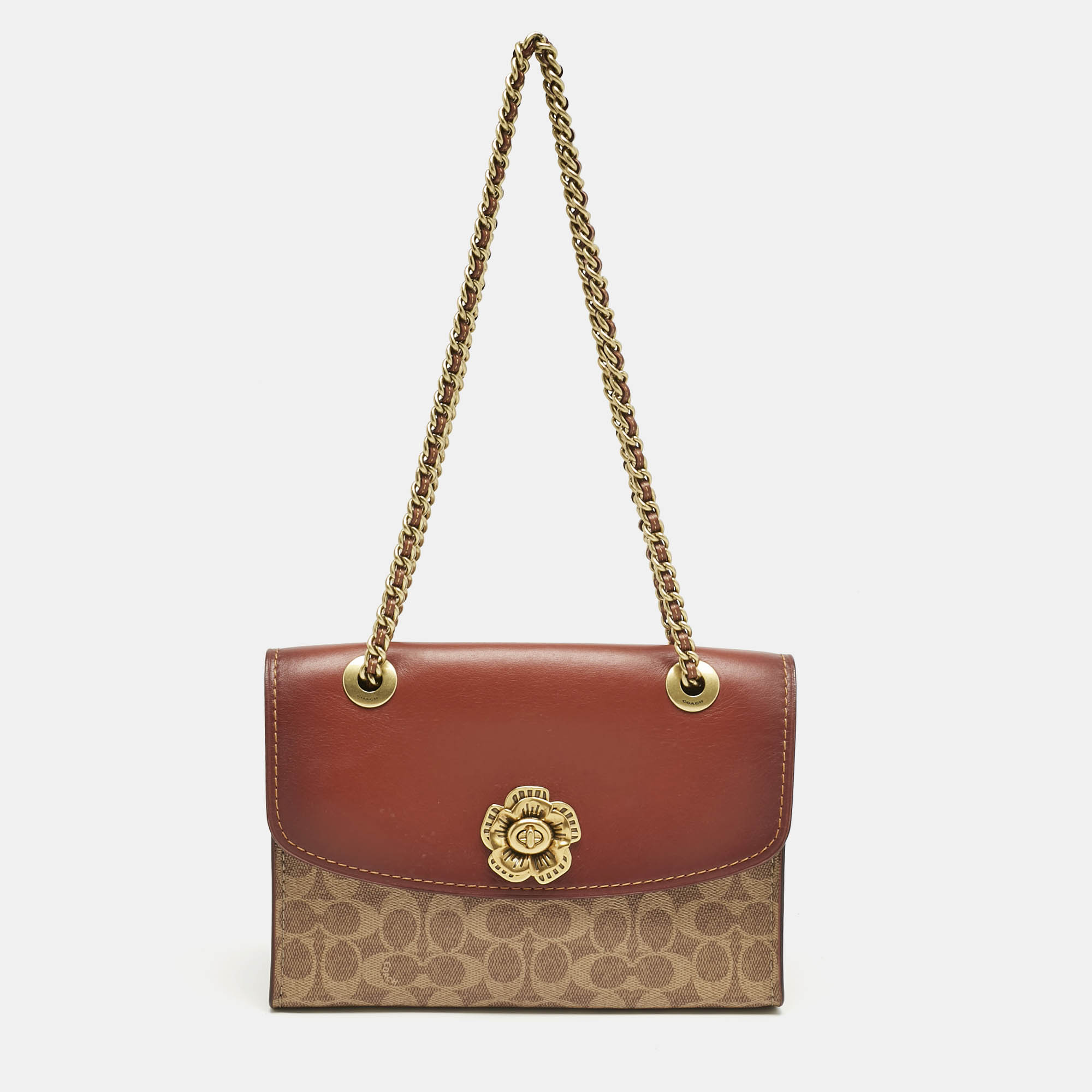 Coach Brown Signature Coated Canvas and Leather Parker Shoulder Bag
Coach Brown Signature Coated Canvas and Leather Parker Shoulder Bag