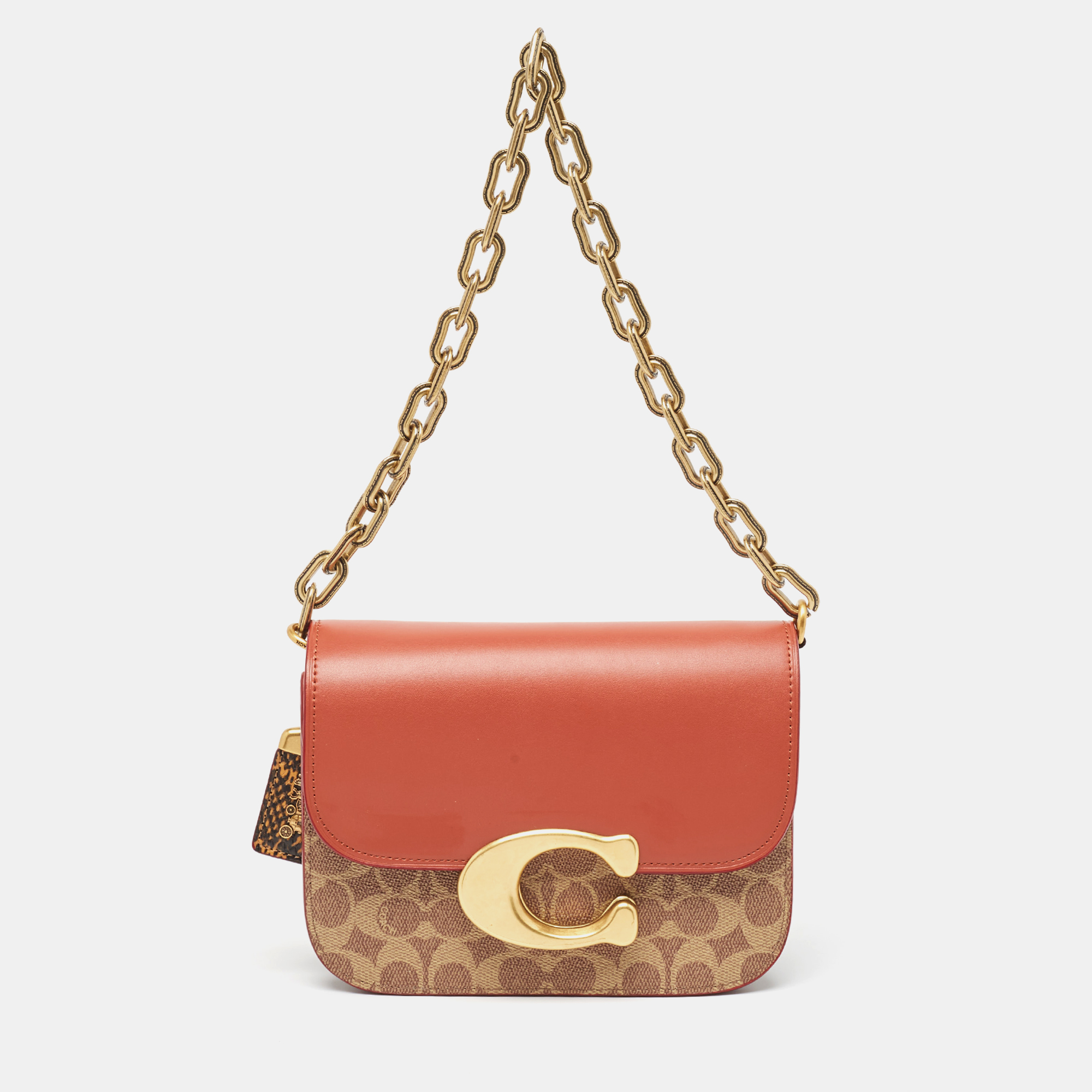 Coach brown/beige signature coated canvas, python embossed and leather idol bag