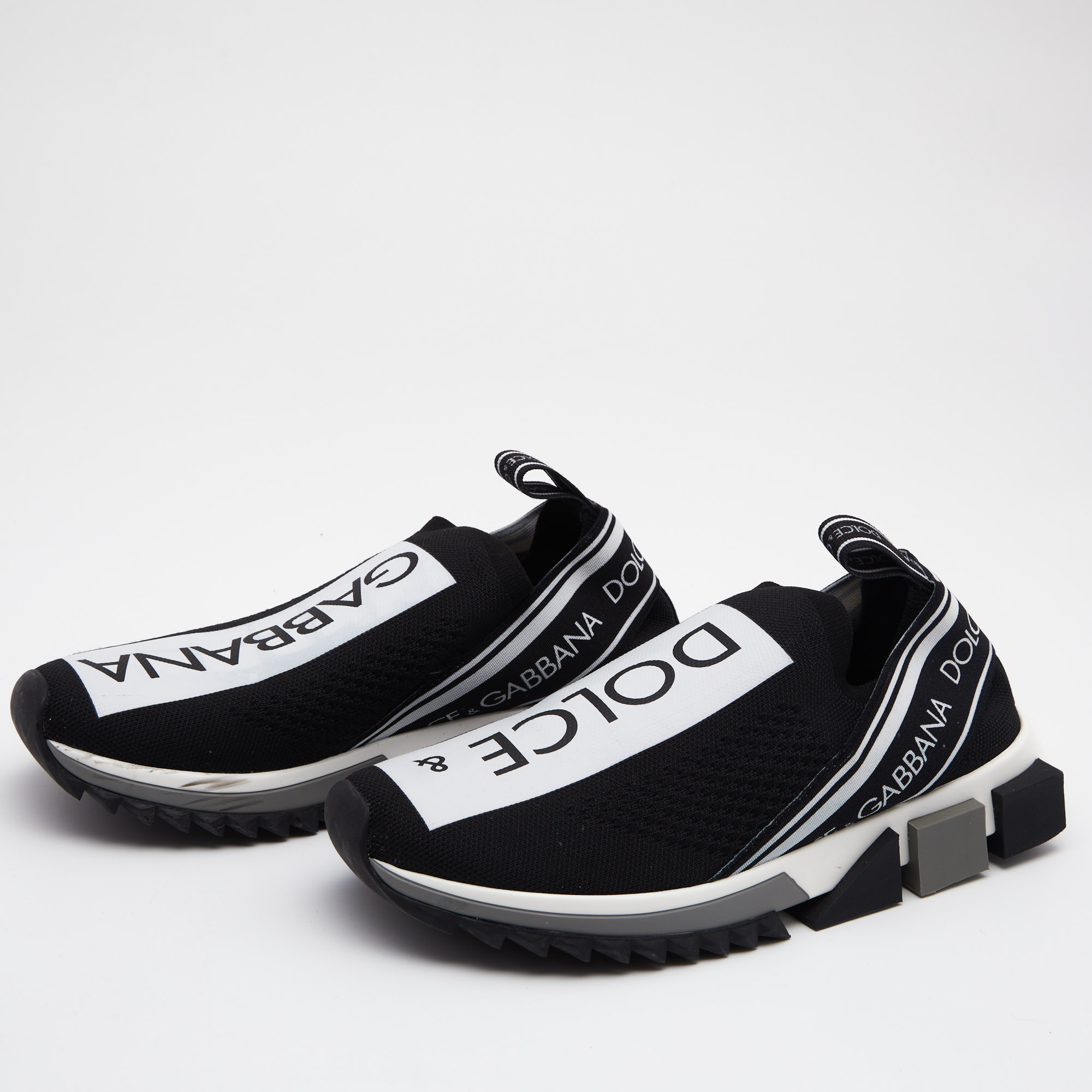 Dolce & Gabbana Black/White Knit Fabric Sorrento Slip On Sneakers Size
Dolce & Gabbana Black/White Knit Fabric Sorrento Slip On Sneakers Size