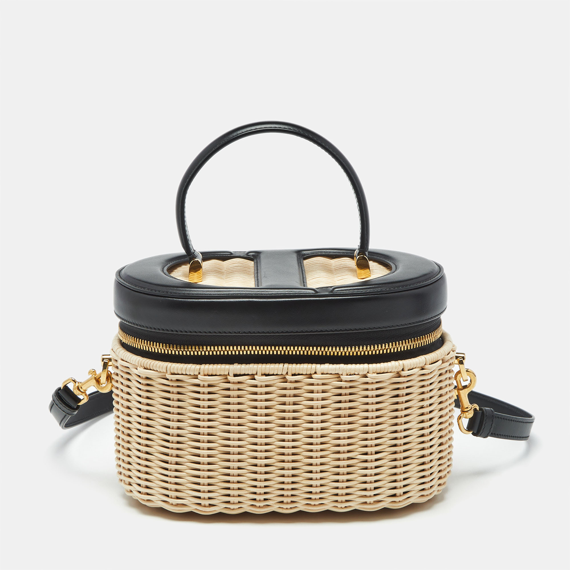 Dior Beige/Black Wicker and Leather CD Vanity Bag
Dior Beige/Black Wicker and Leather CD Vanity Bag