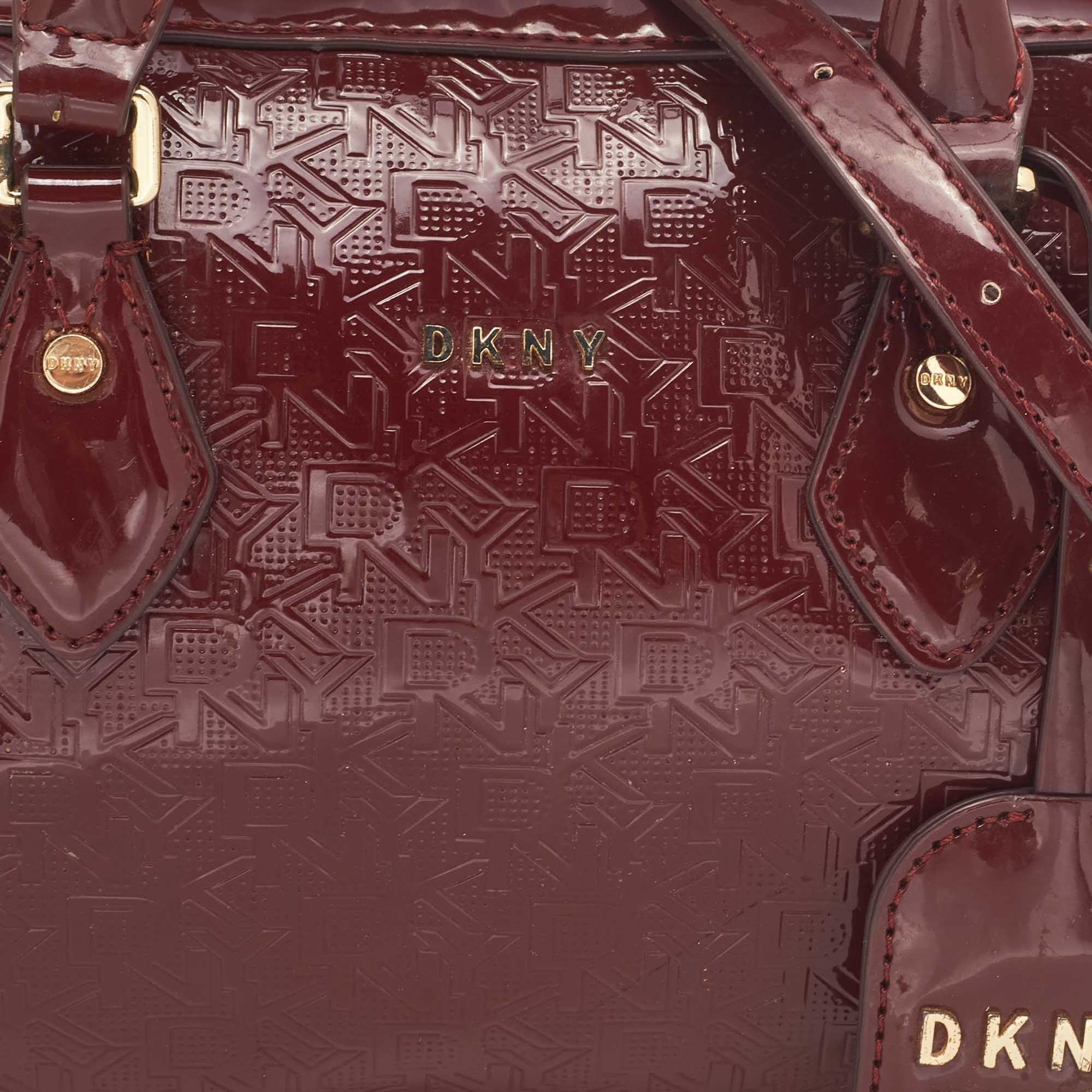 Dkny Dark Red Monogram Embossed Patent Leather Boston Bag