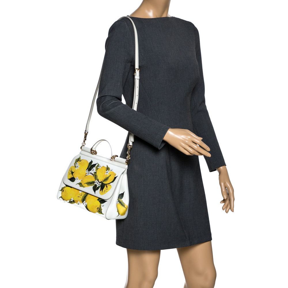 Dolce & Gabbana White/Yellow Floral Print Leather Medium Miss Sicily Top Handle Bag
Dolce & Gabbana White/Yellow Floral Print Leather Medium Miss Sicily Top Handle Bag