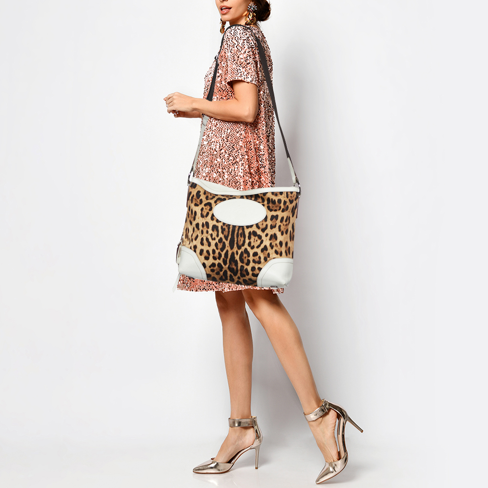 Dolce & Gabbana Brown/White Leopard Print Canvas and Leather Messenger Bag
Dolce & Gabbana Brown/White Leopard Print Canvas and Leather Messenger Bag