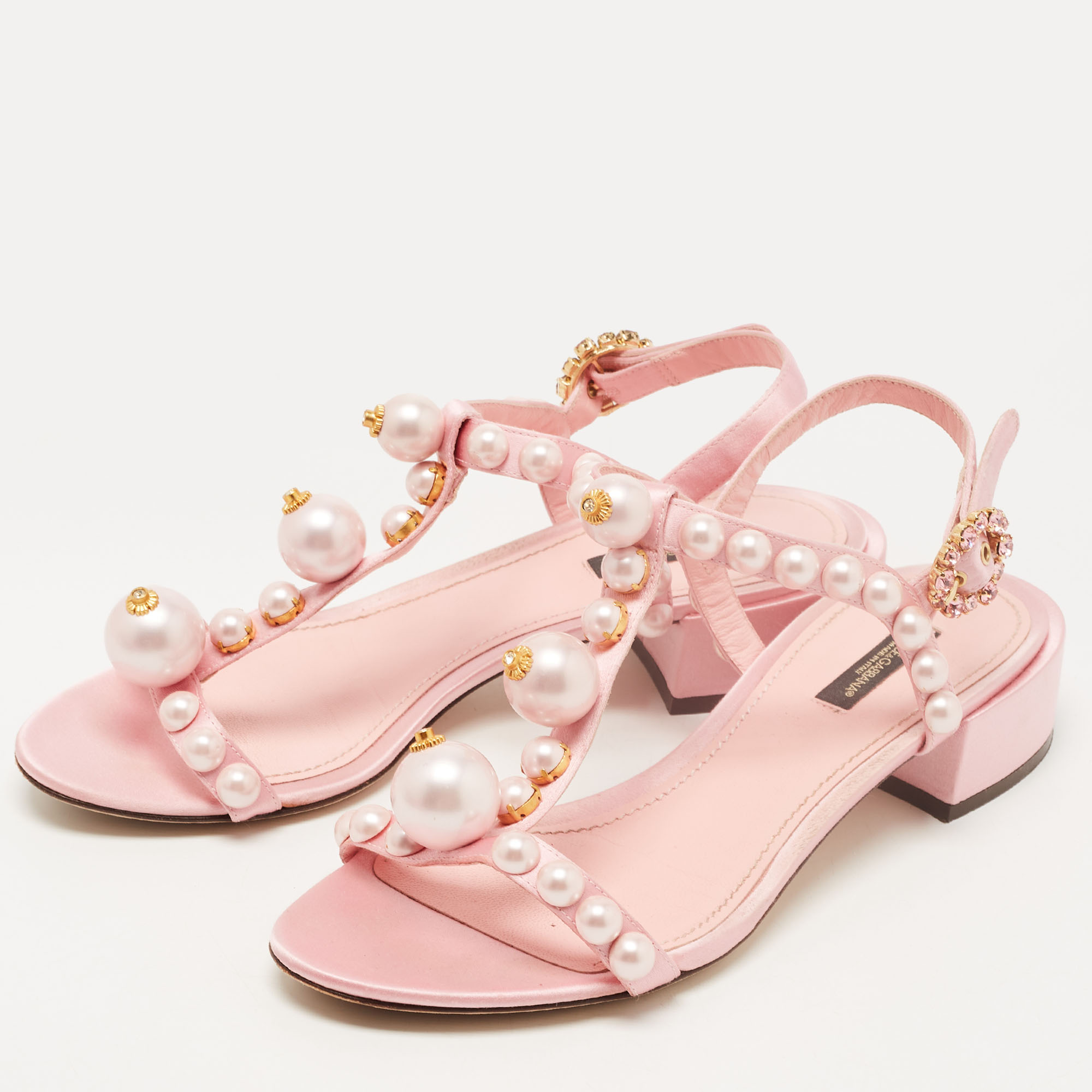 Dolce & Gabbana Pink Satin Pearl Embellished Ankle Strap Flat Sandals Size
Dolce & Gabbana Pink Satin Pearl Embellished Ankle Strap Flat Sandals Size
