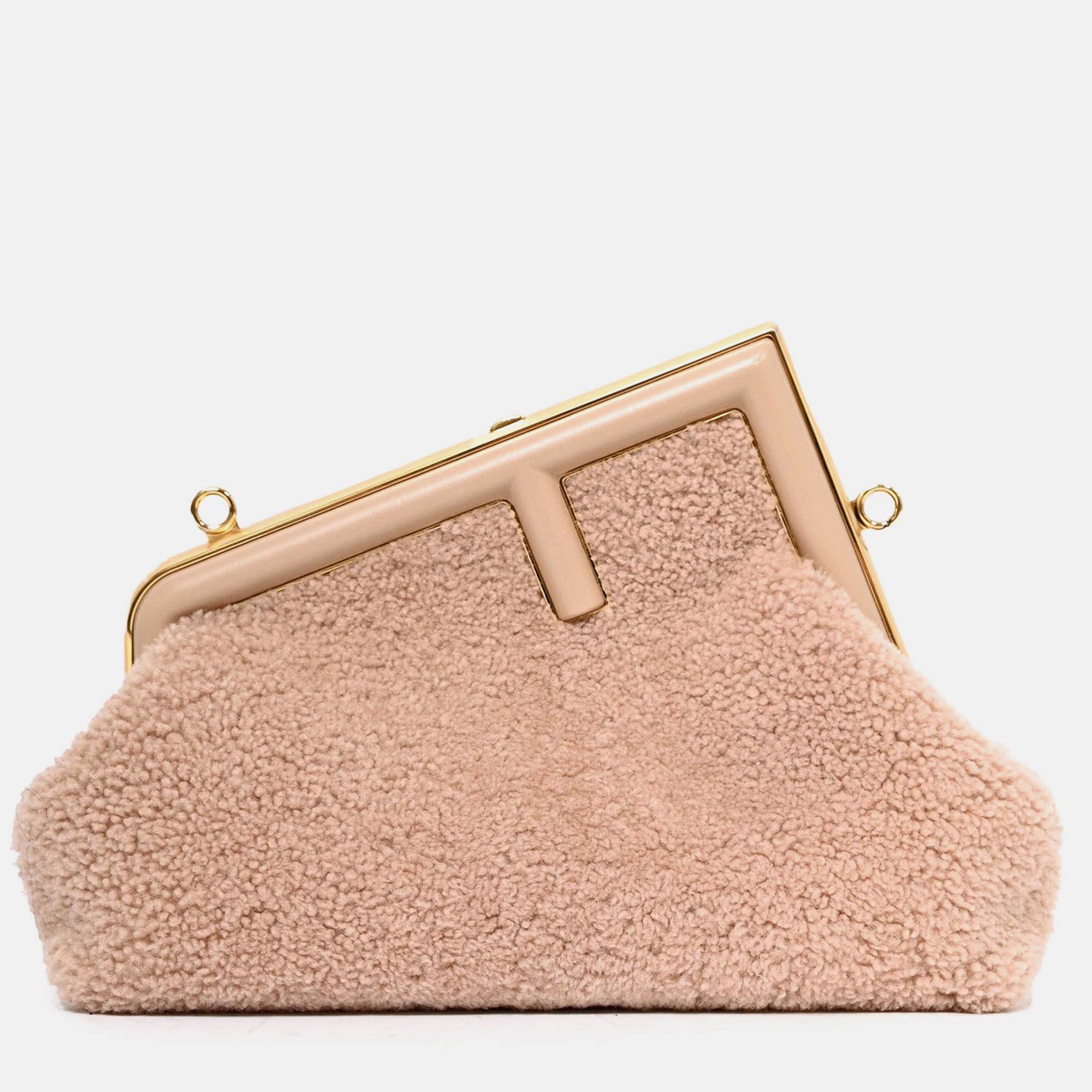 Fendi Pink Shearling Small First Clutch with Strap
Fendi Pink Shearling Small First Clutch with Strap