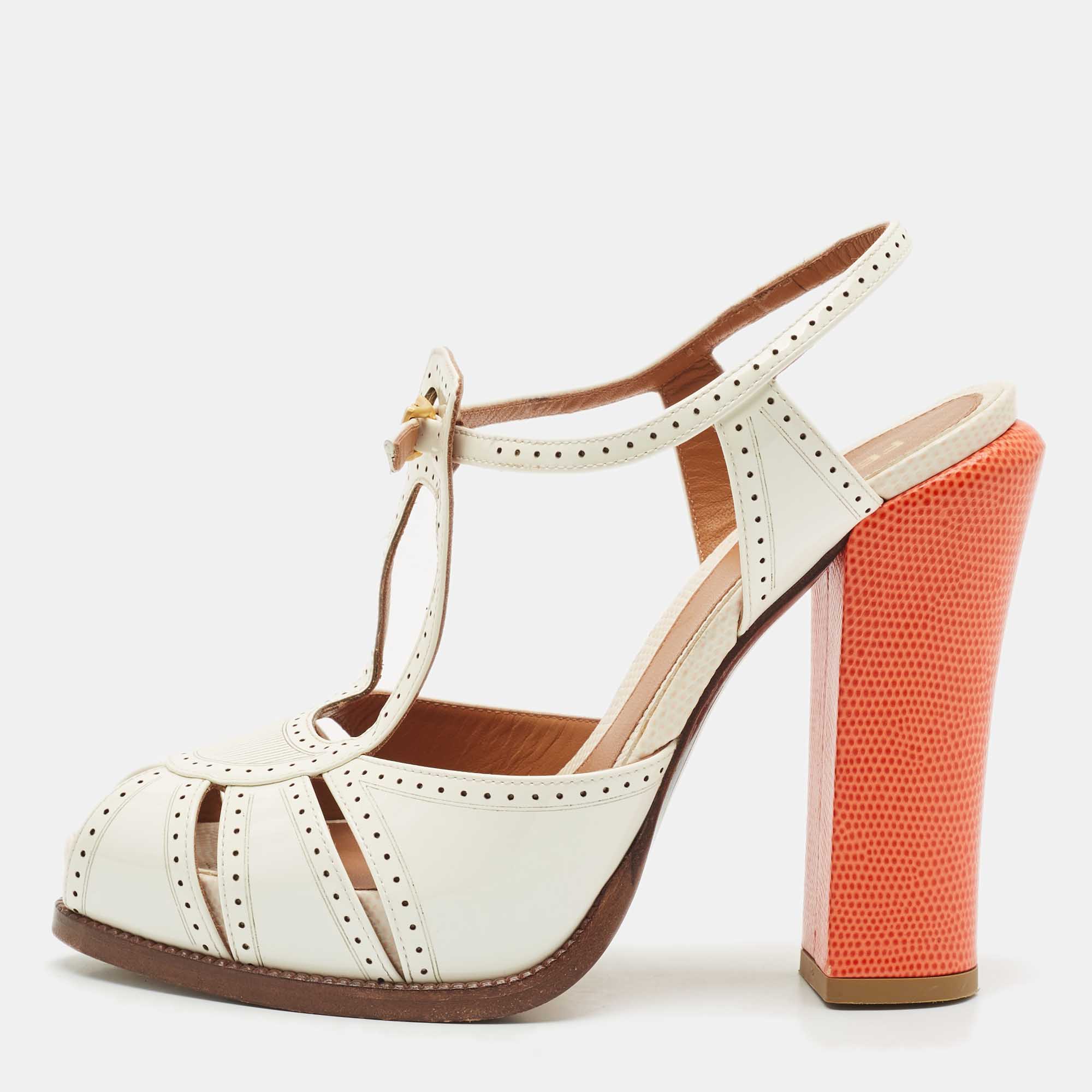 Fendi White/Orange Lizard Embossed and Patent Leather Cut Out T-Strap Sandals Size
Fendi White/Orange Lizard Embossed and Patent Leather Cut Out T-Strap Sandals Size