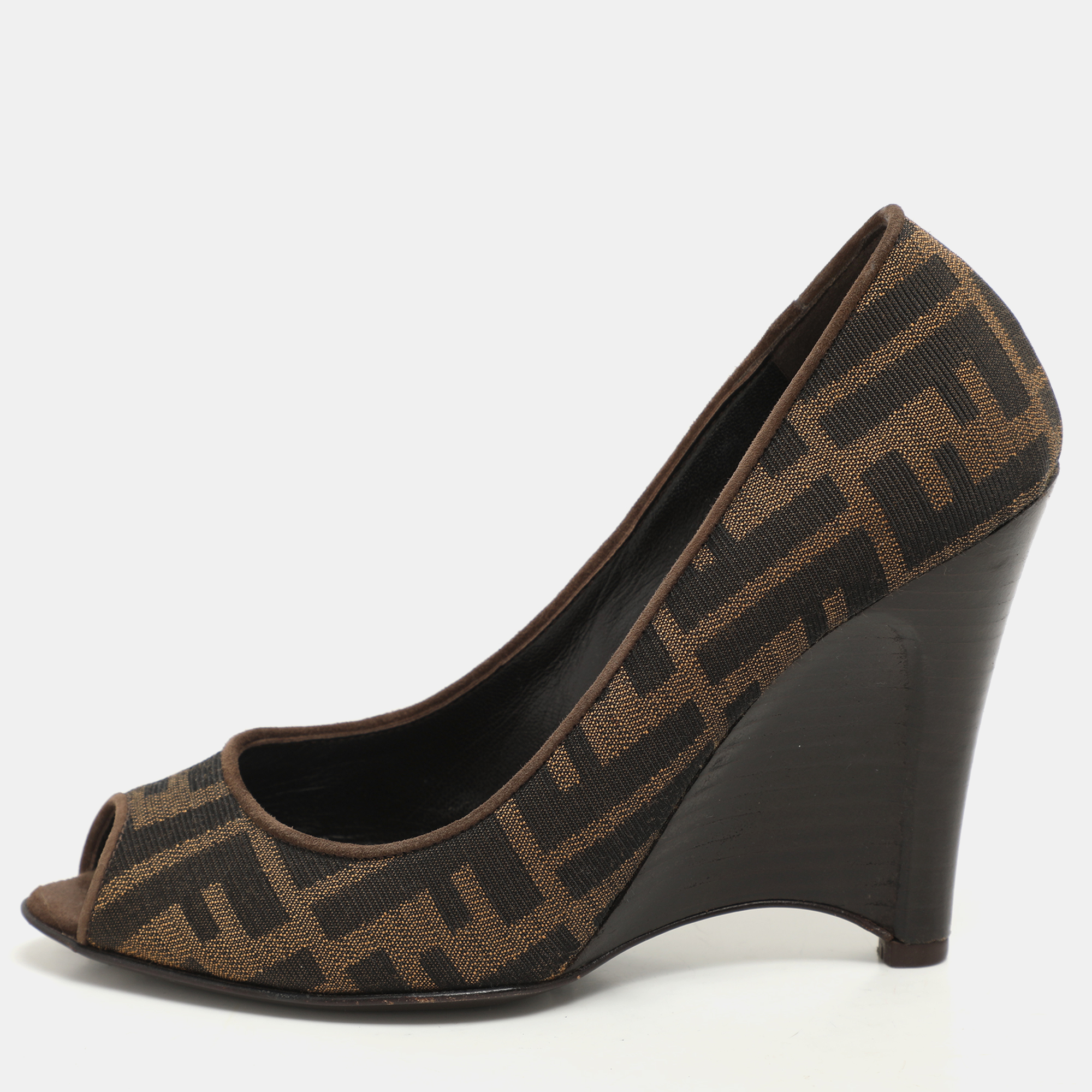 Fendi Tobacco Zucca Canvas and Suede Wedge Peep Toe Pumps Size 36, Brown
Fendi Tobacco Zucca Canvas and Suede Wedge Peep Toe Pumps Size 36, Brown