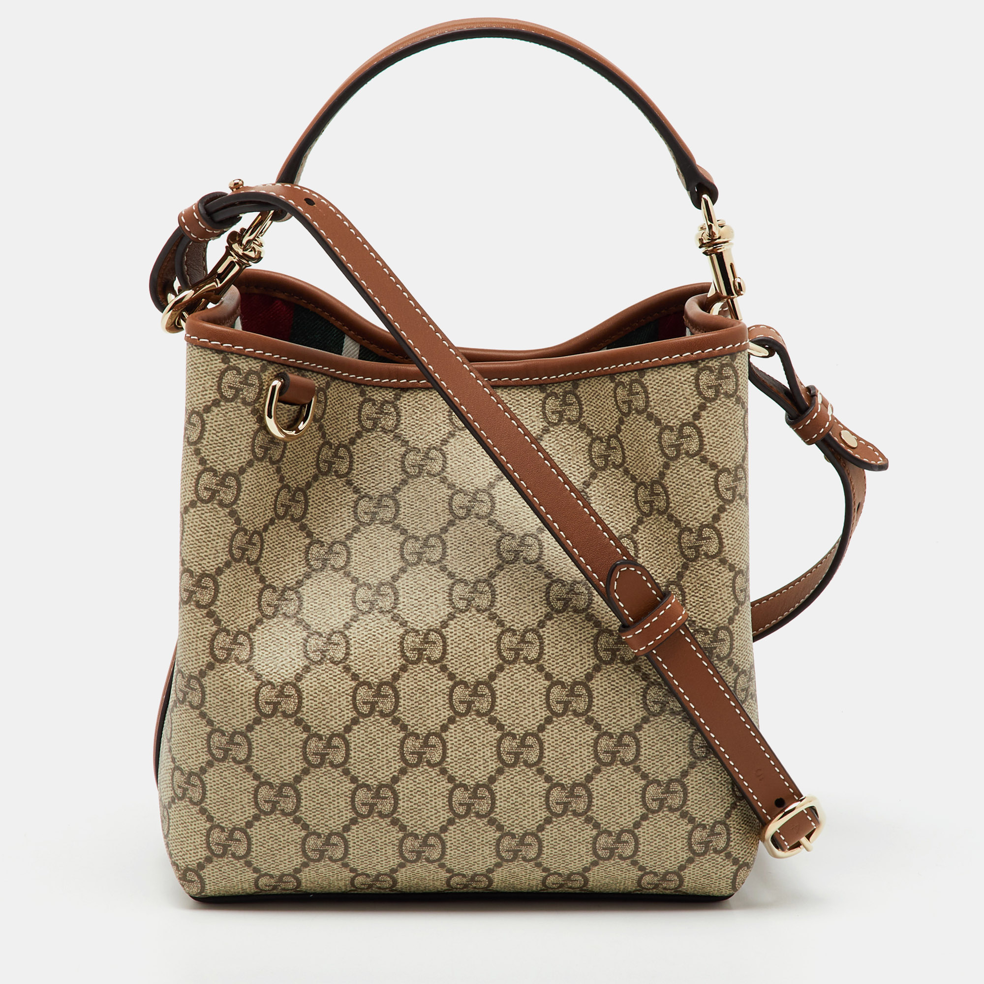 Gucci Beige/Brown GG Supreme Canvas and Leather GG Emblem Small Bucket Bag
Gucci Beige/Brown GG Supreme Canvas and Leather GG Emblem Small Bucket Bag