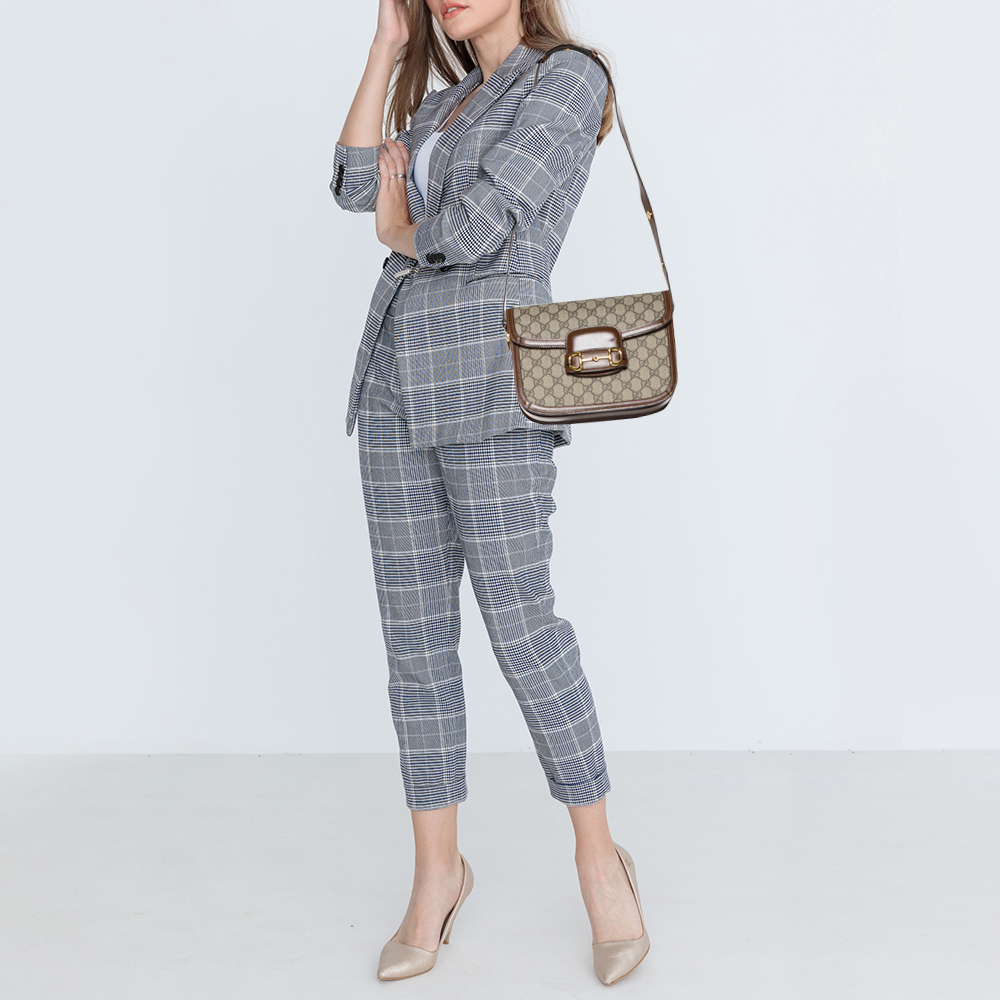 Gucci Beige/Brown GG Supreme Canvas and Leather 1955 Horsebit Shoulder Bag
Gucci Beige/Brown GG Supreme Canvas and Leather 1955 Horsebit Shoulder Bag