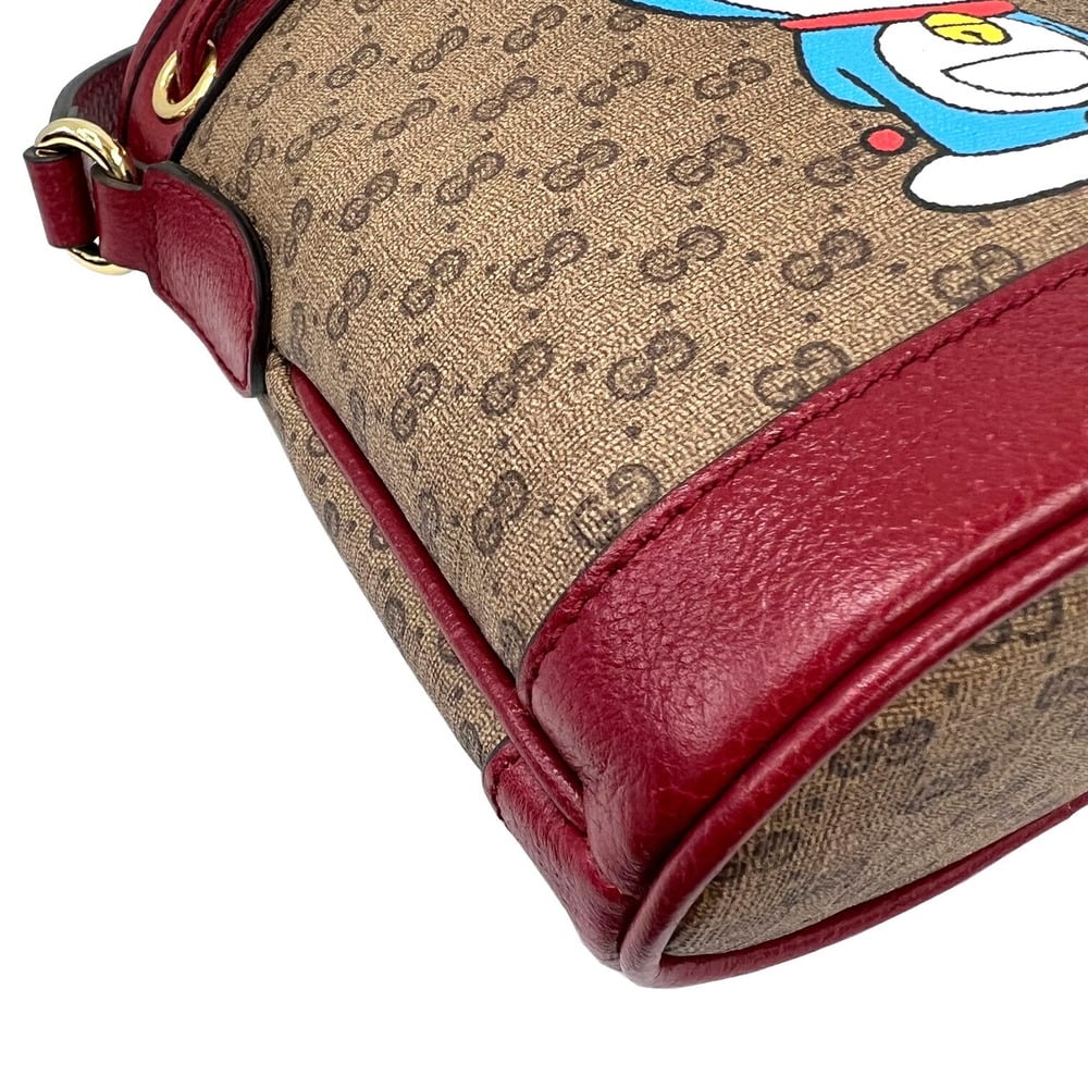 Gucci X Doraemon Beige/Burgundy GG Supreme Canvas And Leather Bucket Bag