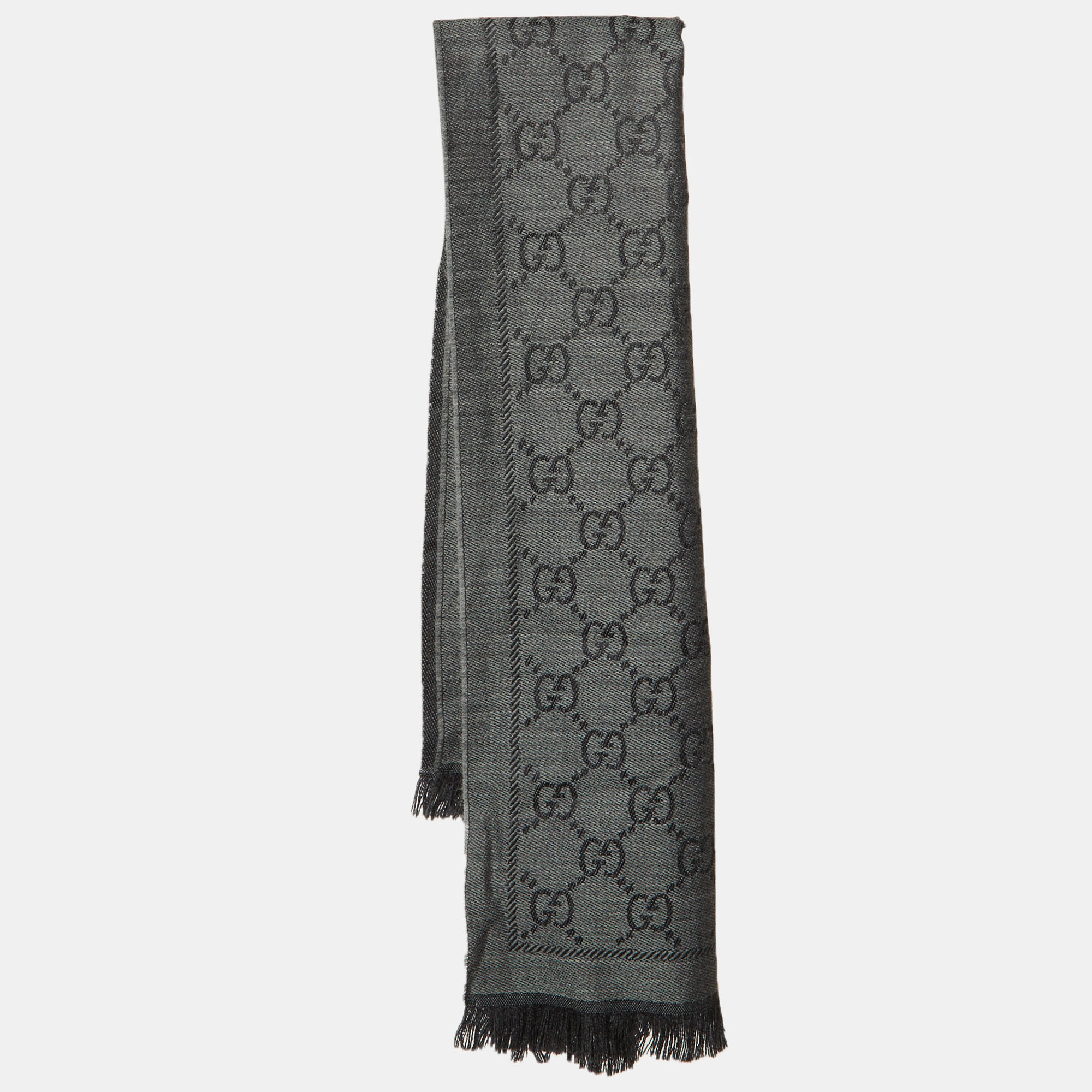 Gucci Grey GG Jacquard Wool Fringed Scarf
Gucci Grey GG Jacquard Wool Fringed Scarf