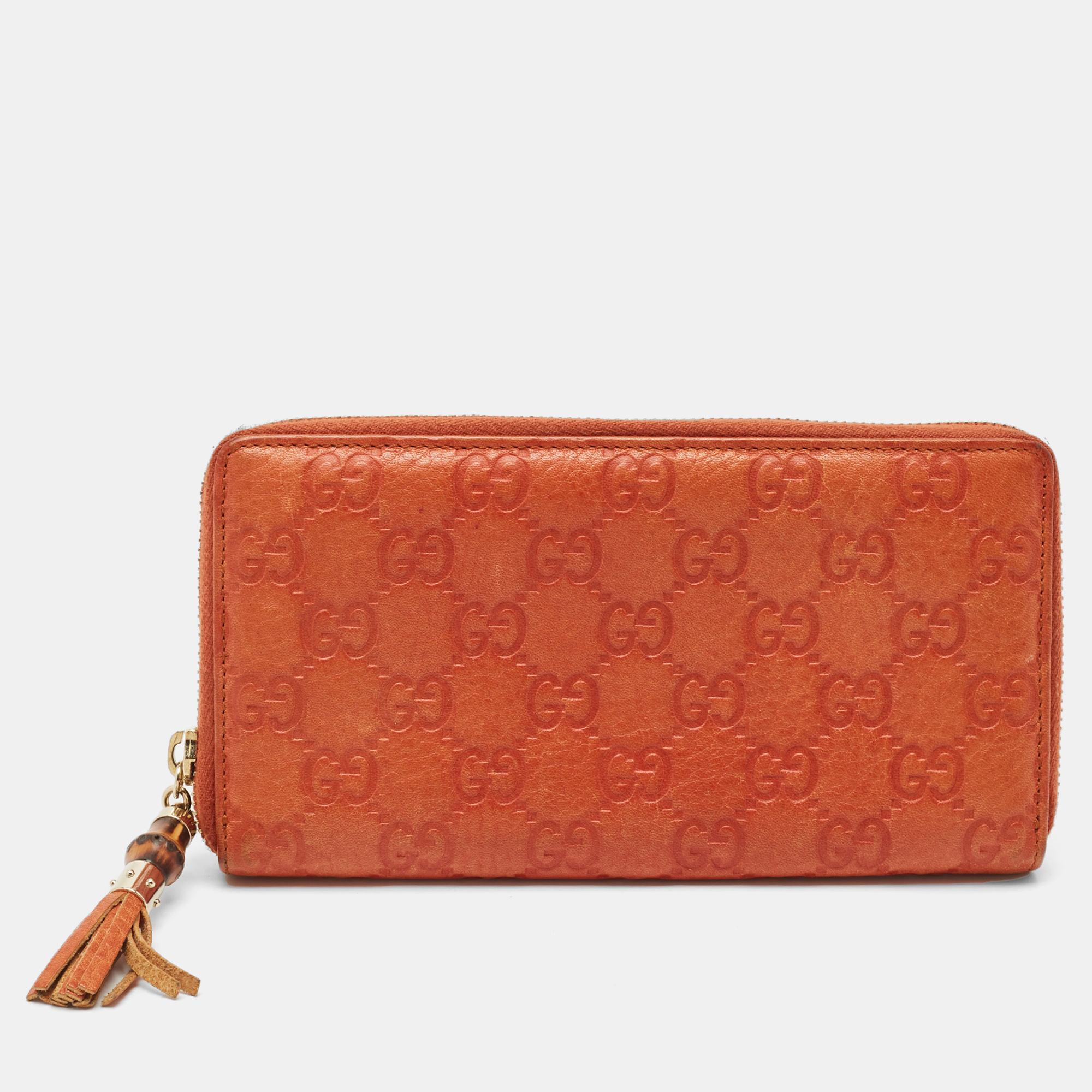 Gucci Orange Guccissima Leather Bamboo Tassel Zip Around Wallet
Gucci Orange Guccissima Leather Bamboo Tassel Zip Around Wallet